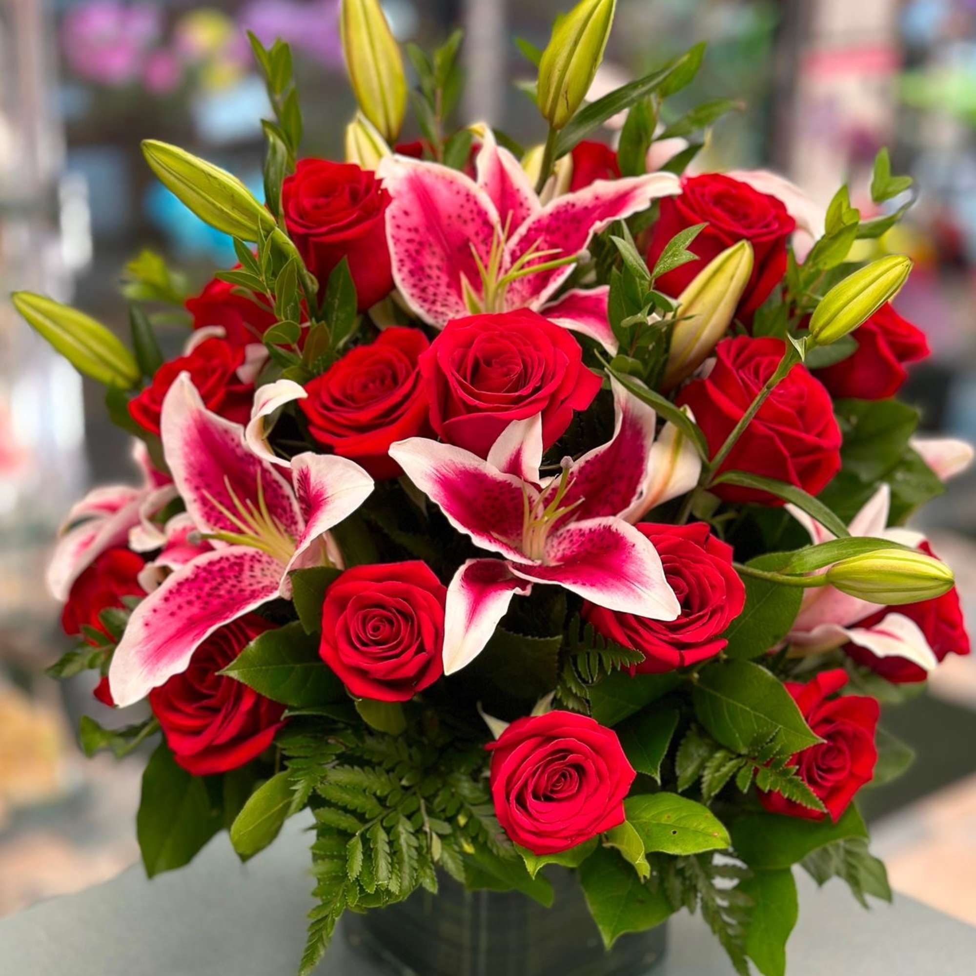 Red roses, pink lilies in Danbury, CT | Cactus Flowers by Tania