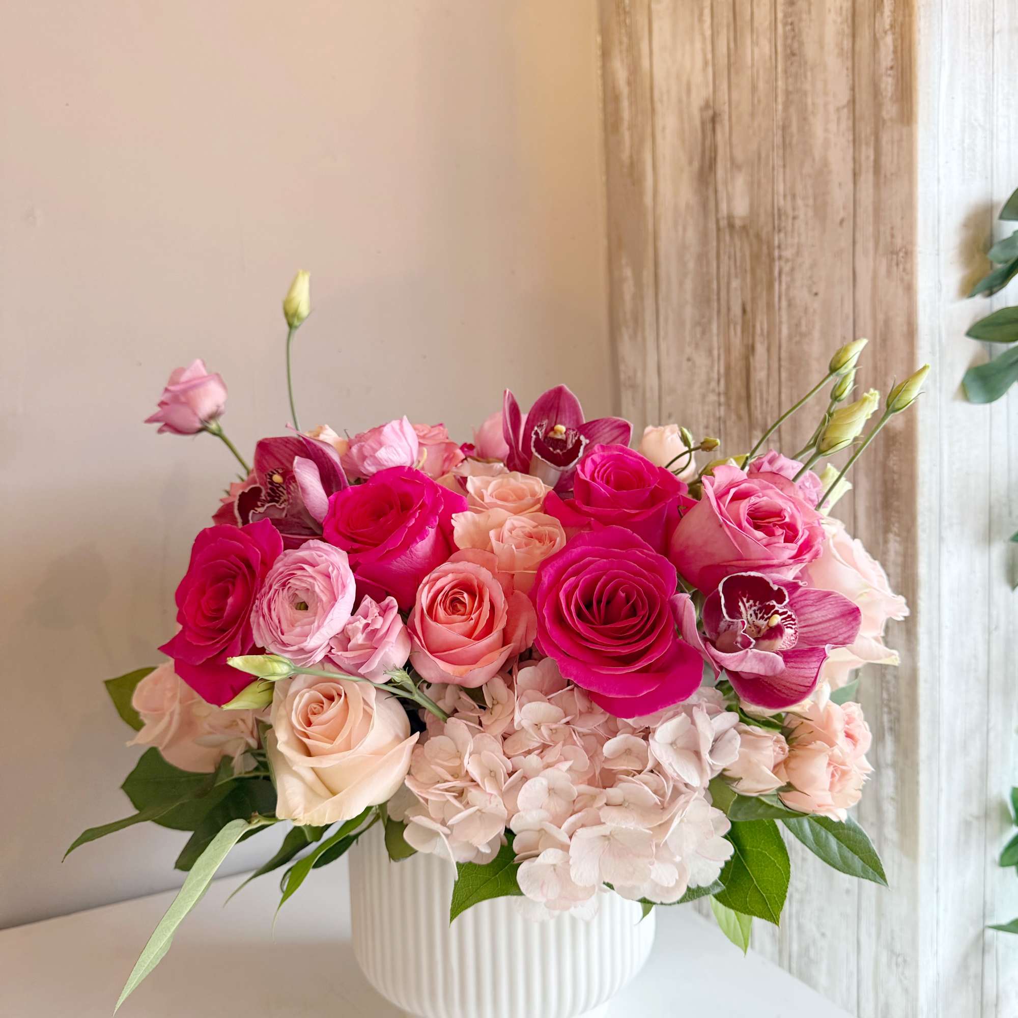 A lush celebration of love in full bloom with vibrant hot pinks