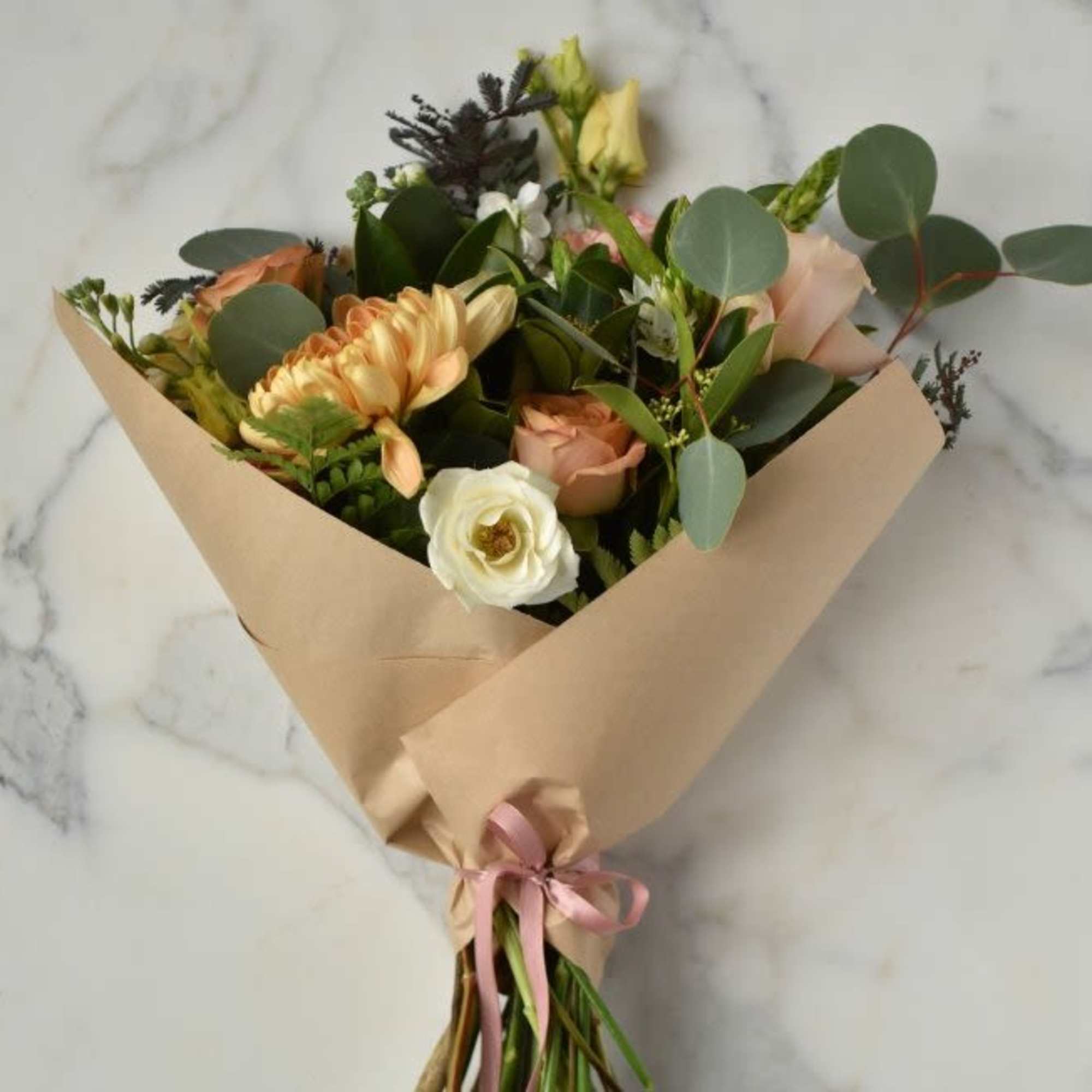 Beautiful assorted flower mix includes roses, fillers and greens. 
 