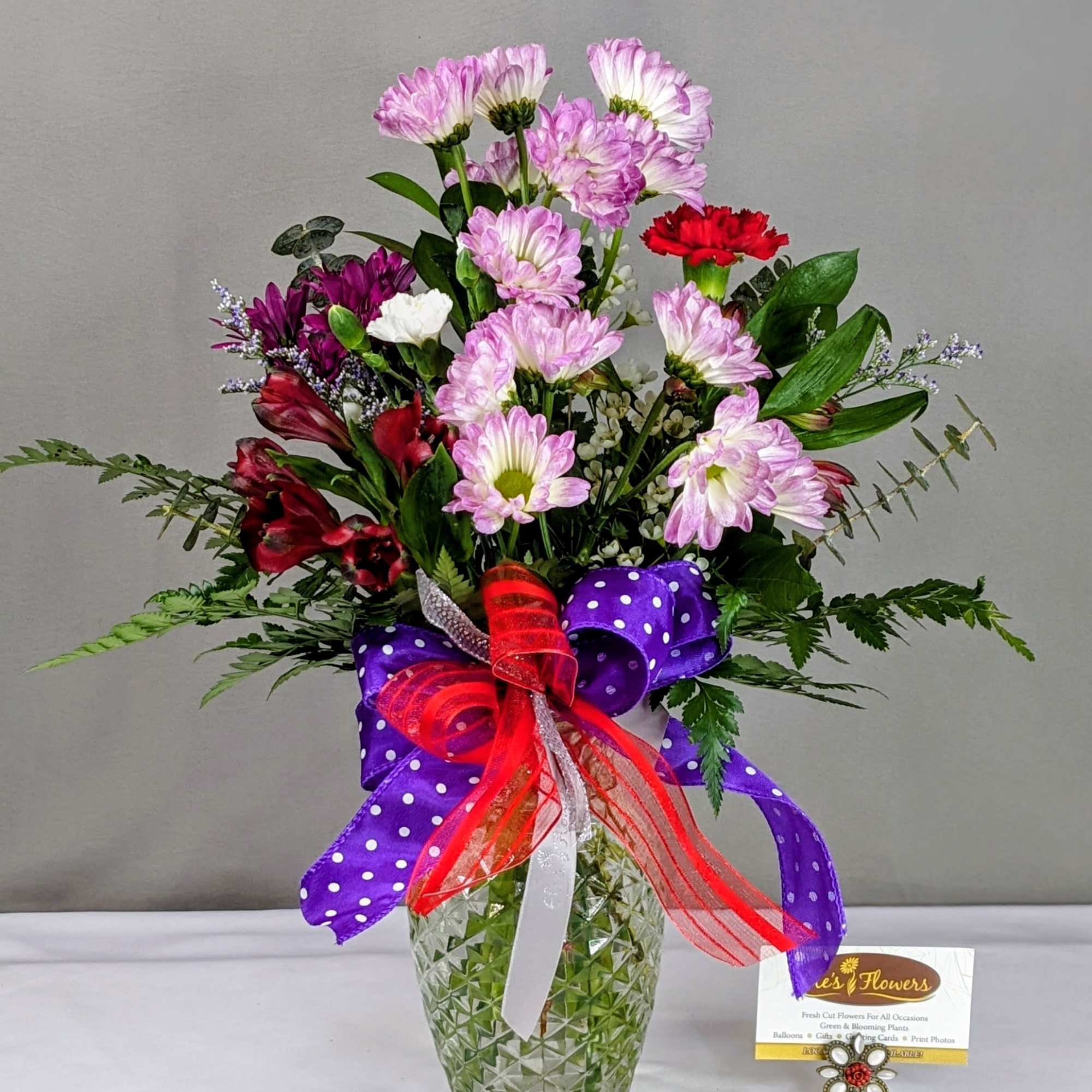 Midnight Kiss is a sultry Valentine&rsquo;s Day arrangement inspired by romance after