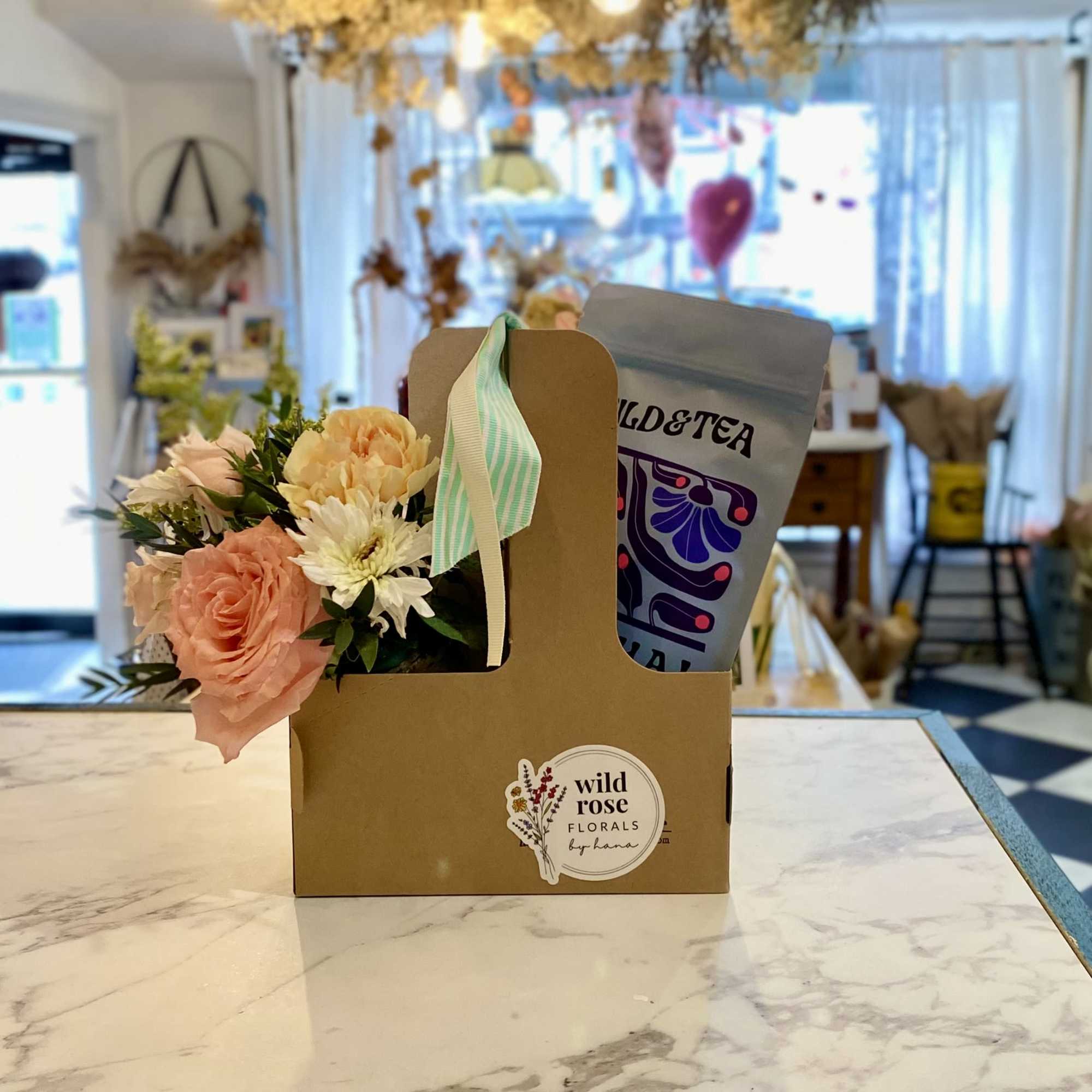 A Flower arrangement and Tea set is a perfect gift for any