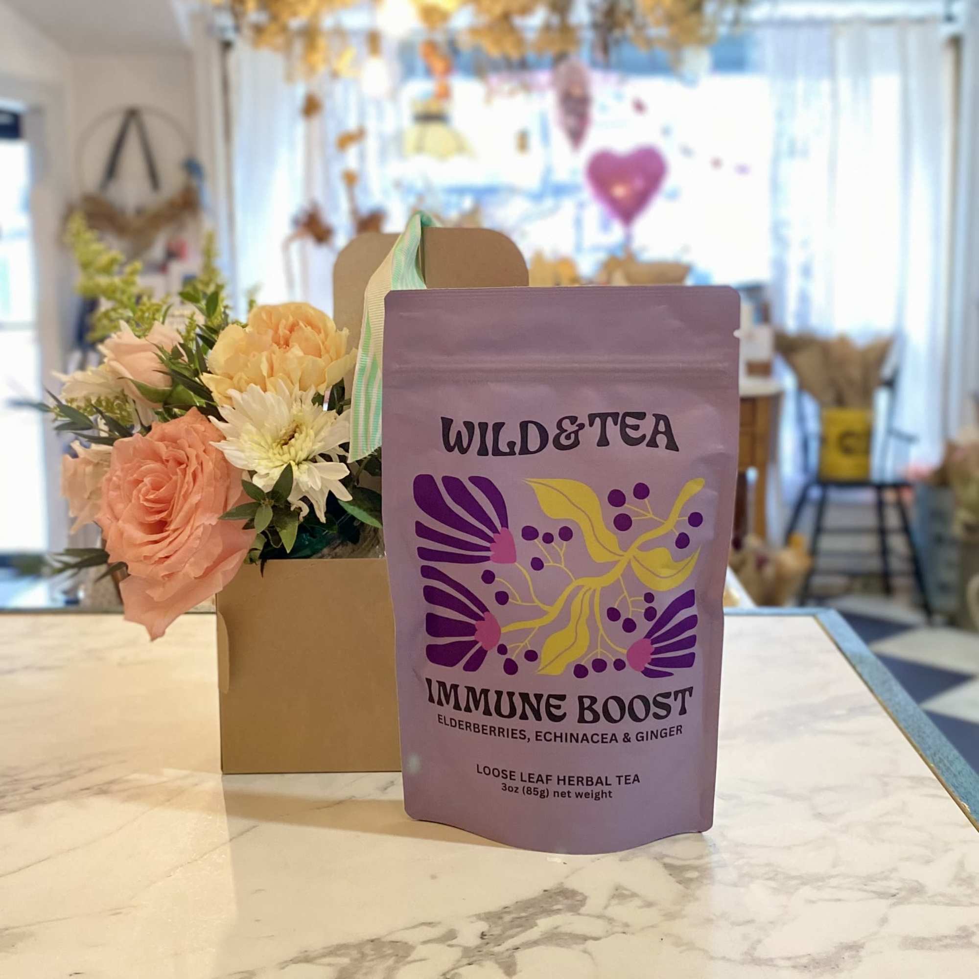 A Flower arrangement and Tea set is a perfect gift for any