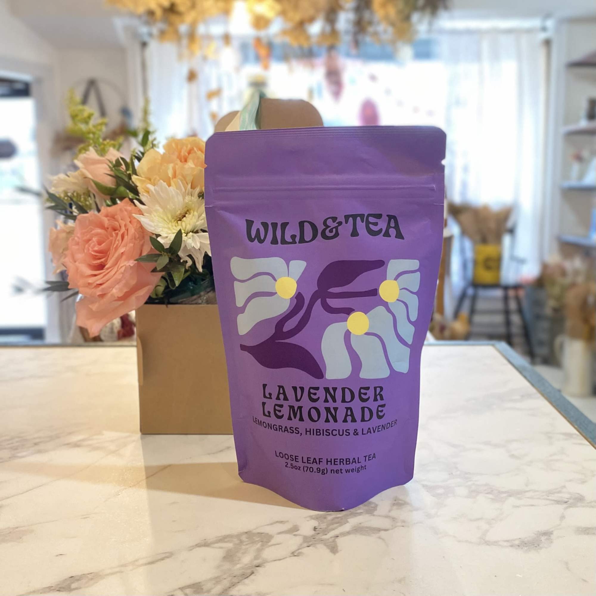 A Flower arrangement and Tea set is a perfect gift for any