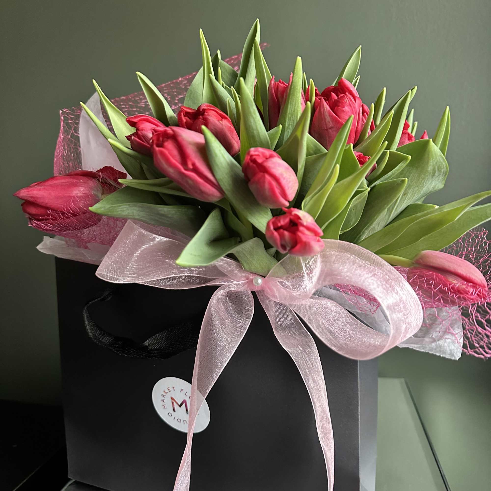 Beautiful double tulips available in assorted colors. Wrapped up in satin ribbon