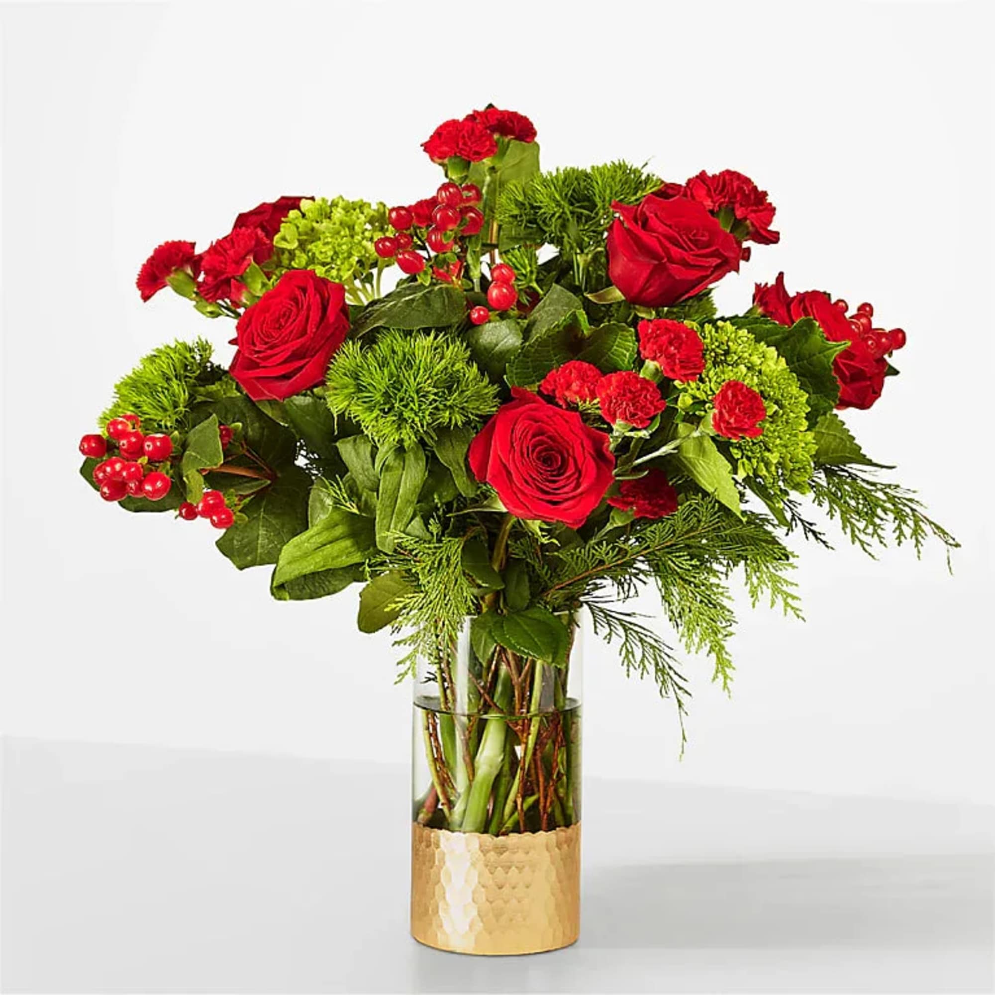 Cozy up with these traditional red and green blooms, a timeless gift