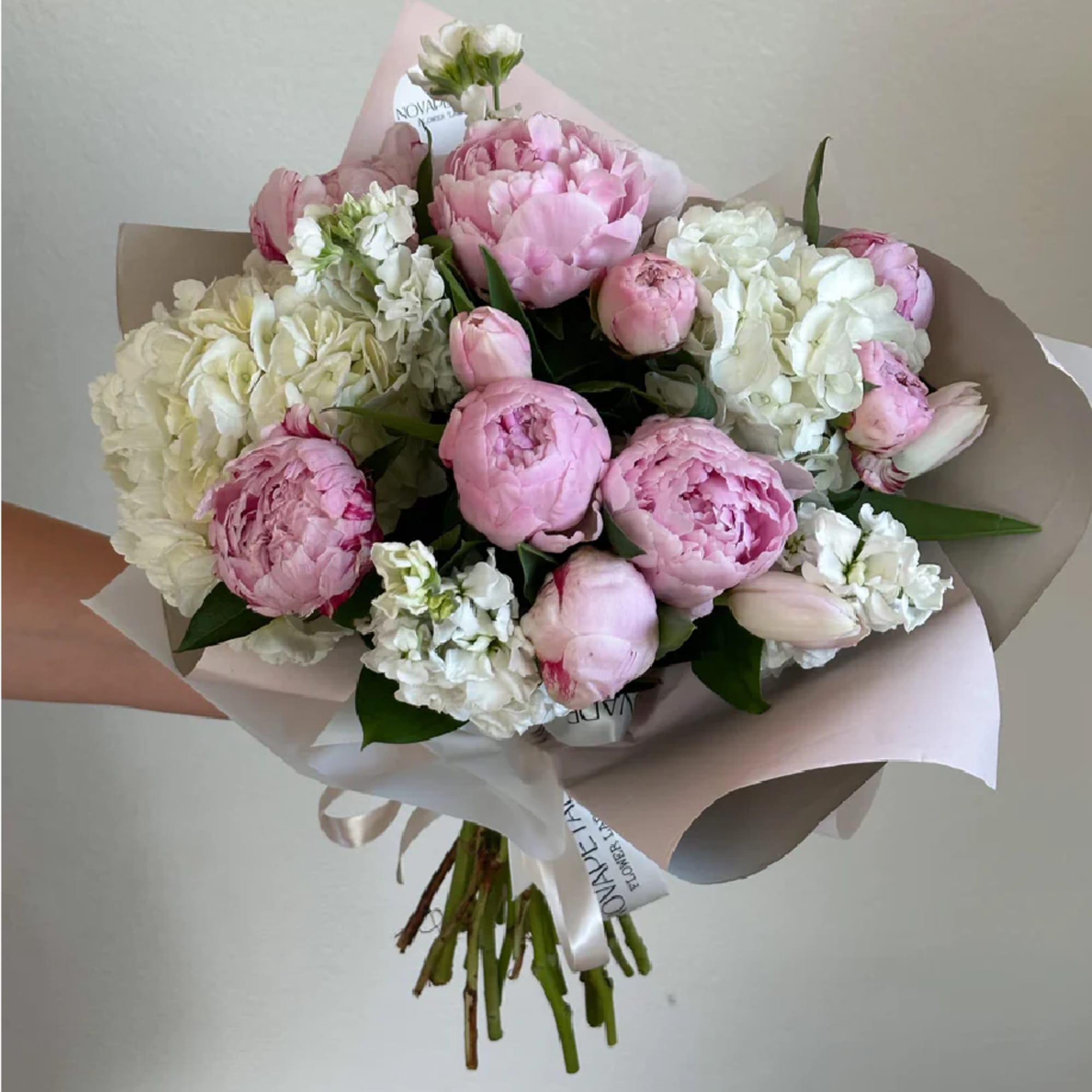 "Experience luxury and elegance with our Blush mix Bouquet, featuring ONLY premium
