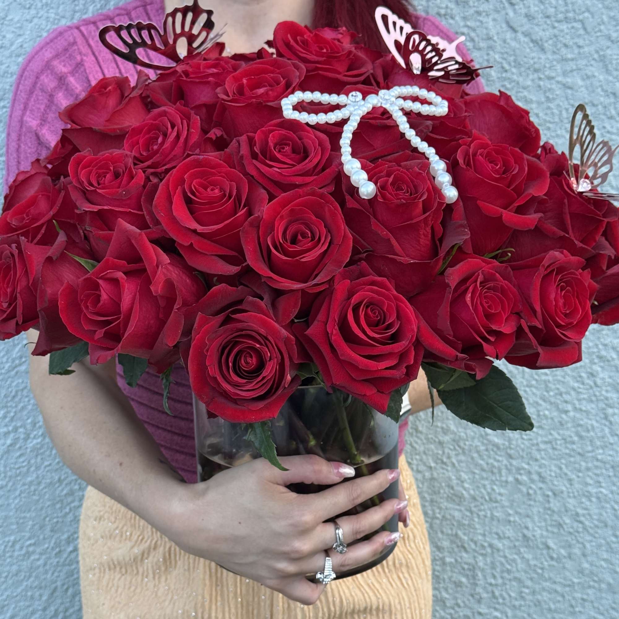 Make a bold statement with this beautifully simple design. Three Dozen Red