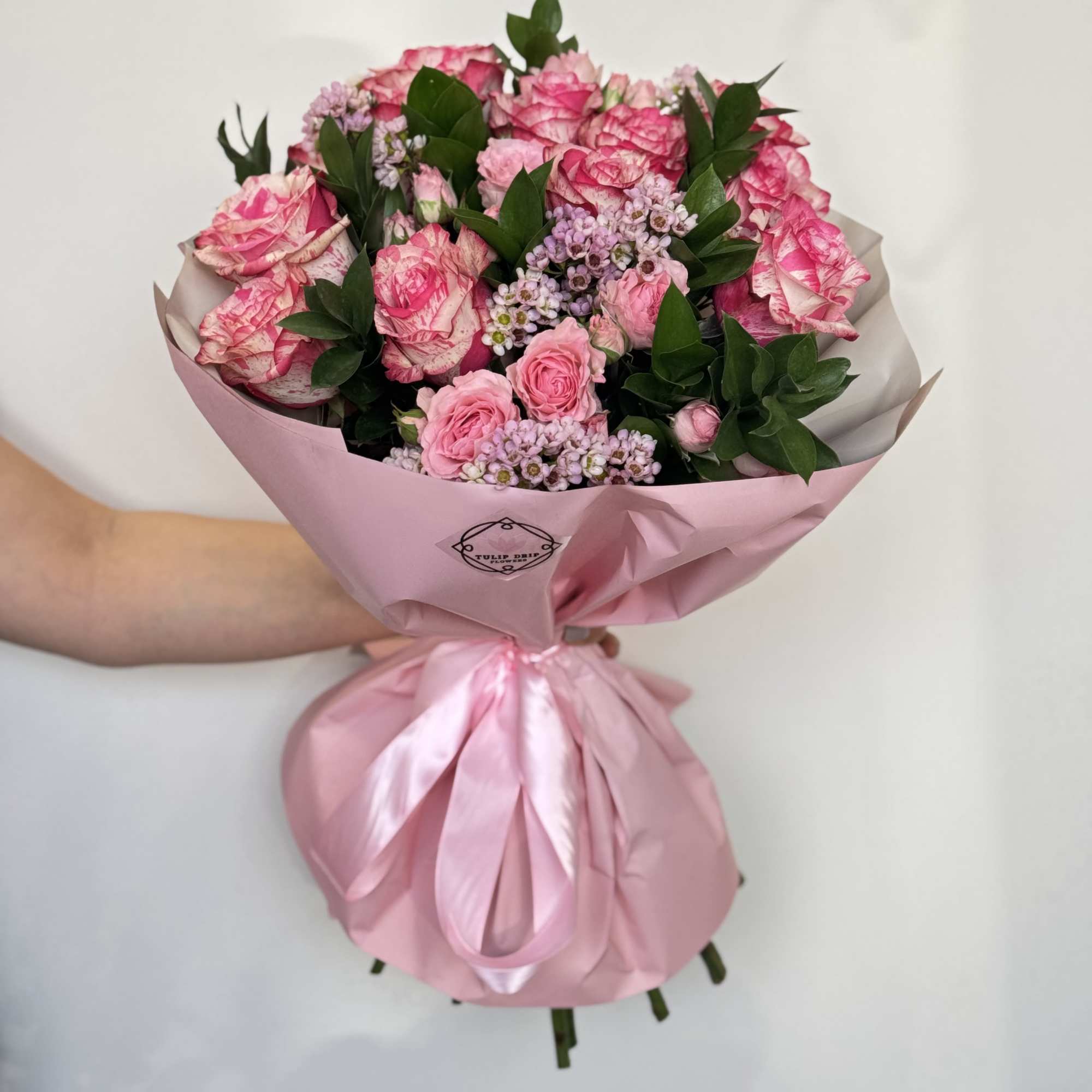 The Sweet Charm Bouquet is a simple yet elegant medium-sized arrangement, perfect