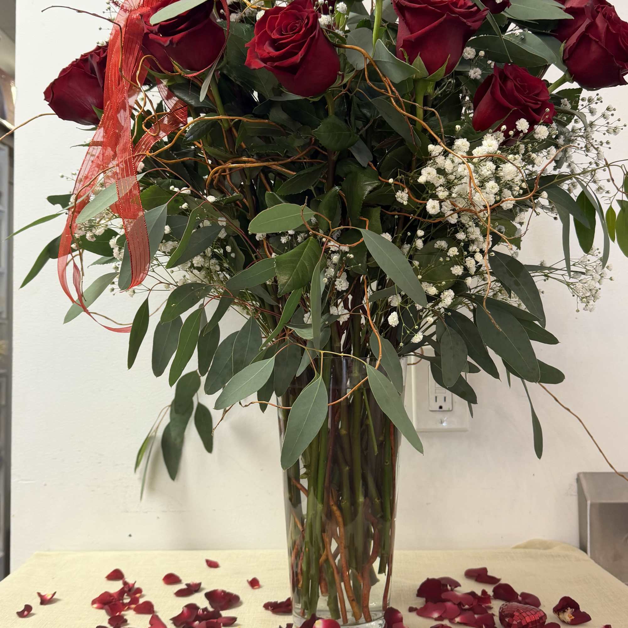  luxury Explorer Red Roses with a touch of curly willow and