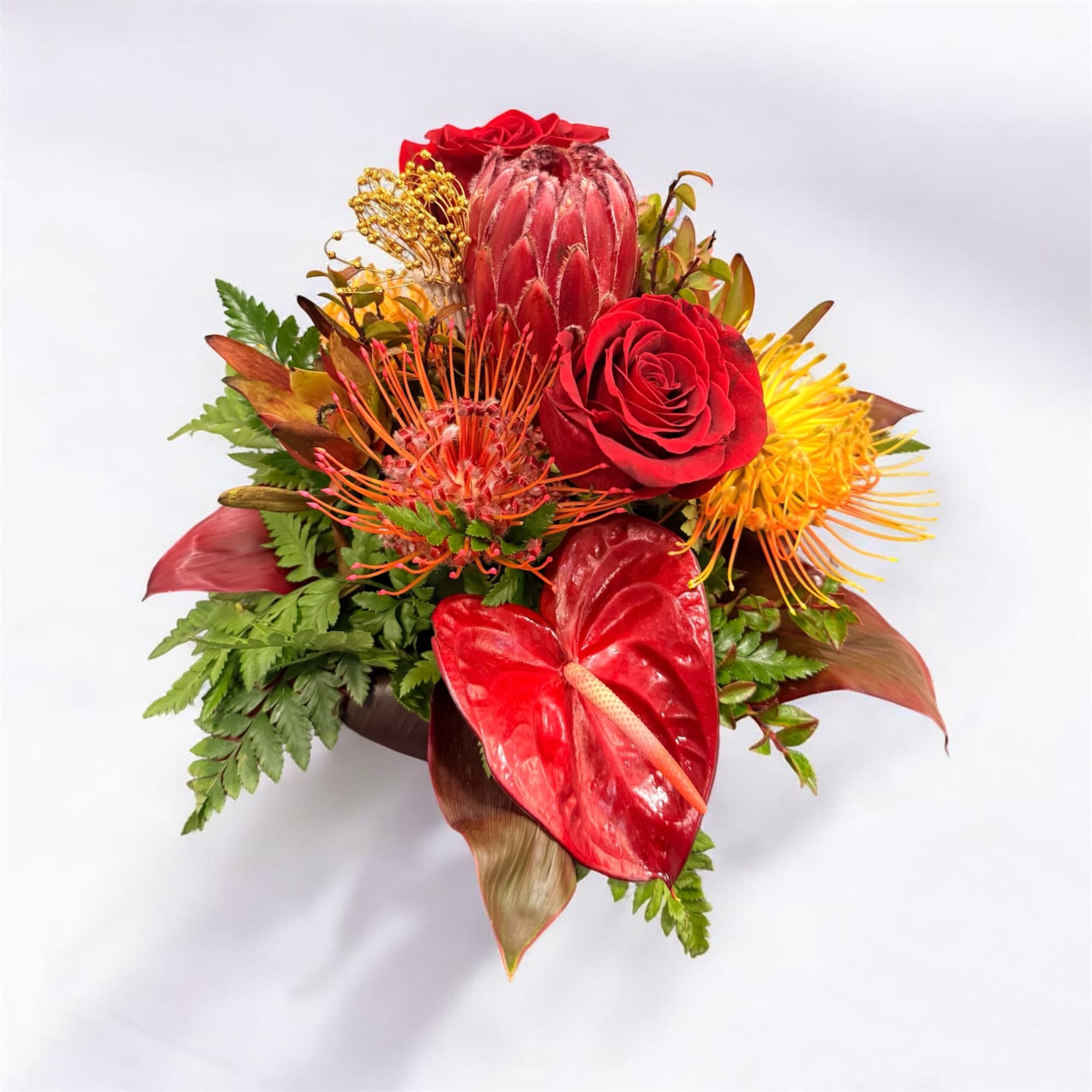 Island tropical fuse with South American roses free form style. 