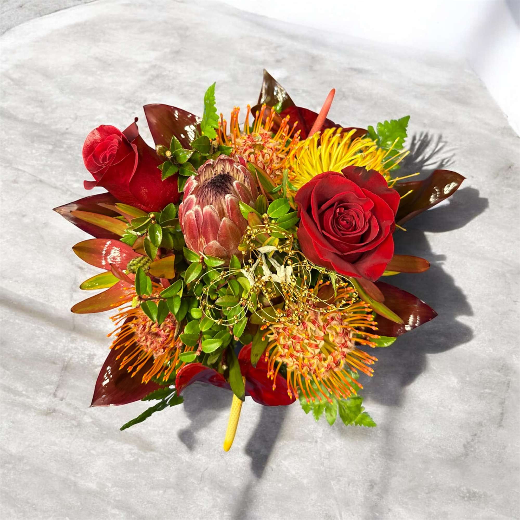 Island tropical fuse with South American roses free form style. 