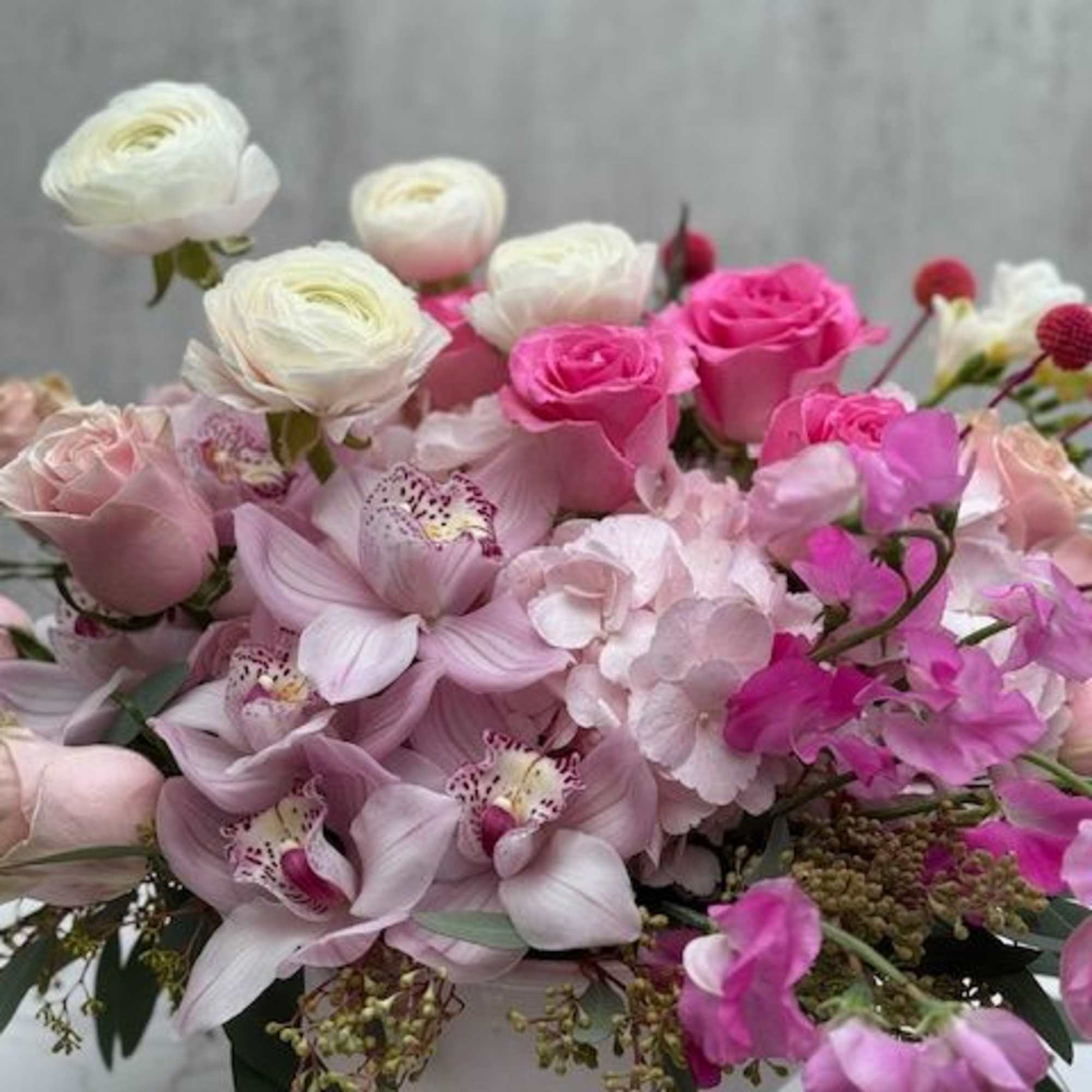 Large 8" round pink ceramic container filled with pink hydrangeas, pink roses