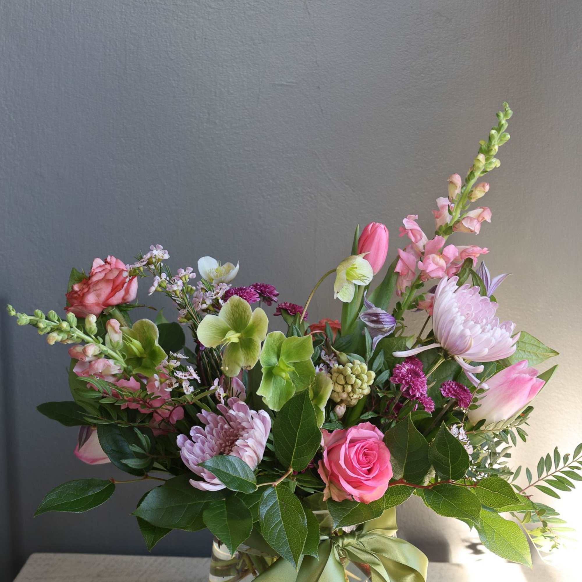 A mix of seasonal florals mixed with lemon leaf and any fun