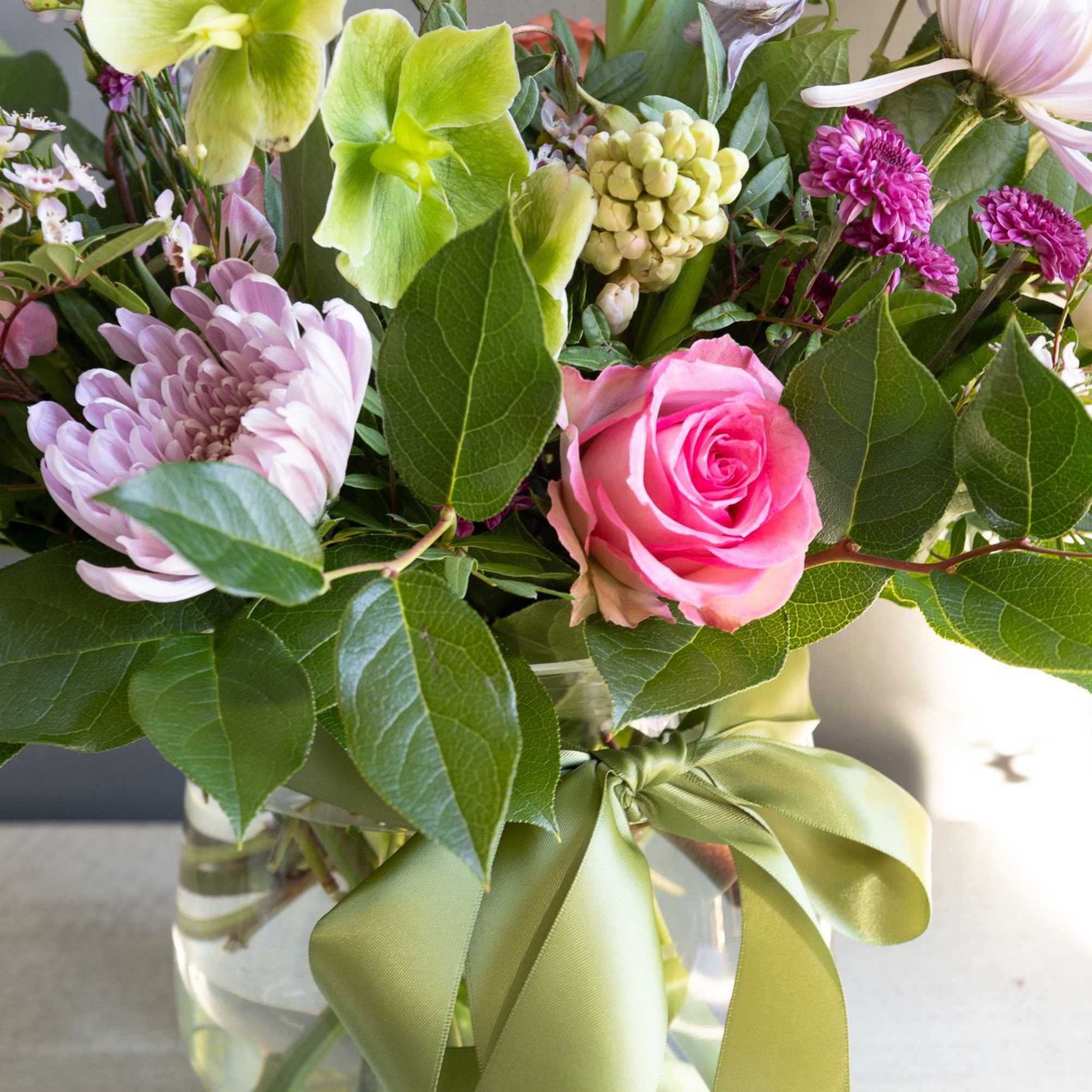 A mix of seasonal florals mixed with lemon leaf and any fun