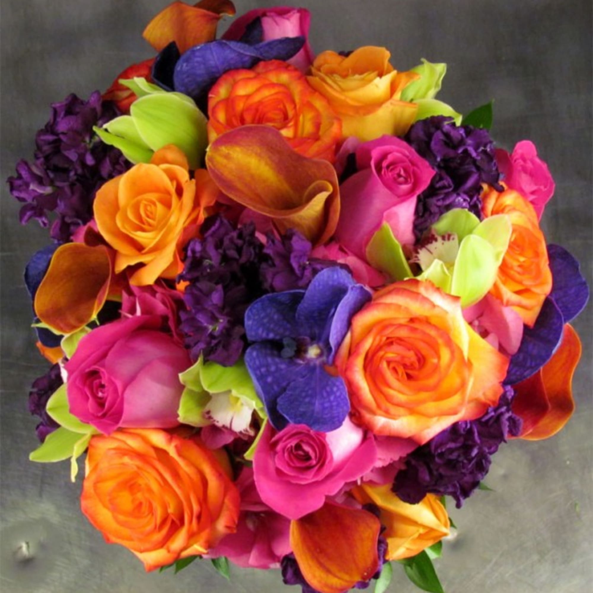 A little of everything in this jewel-toned Bridal Bouquet, our exclusive design