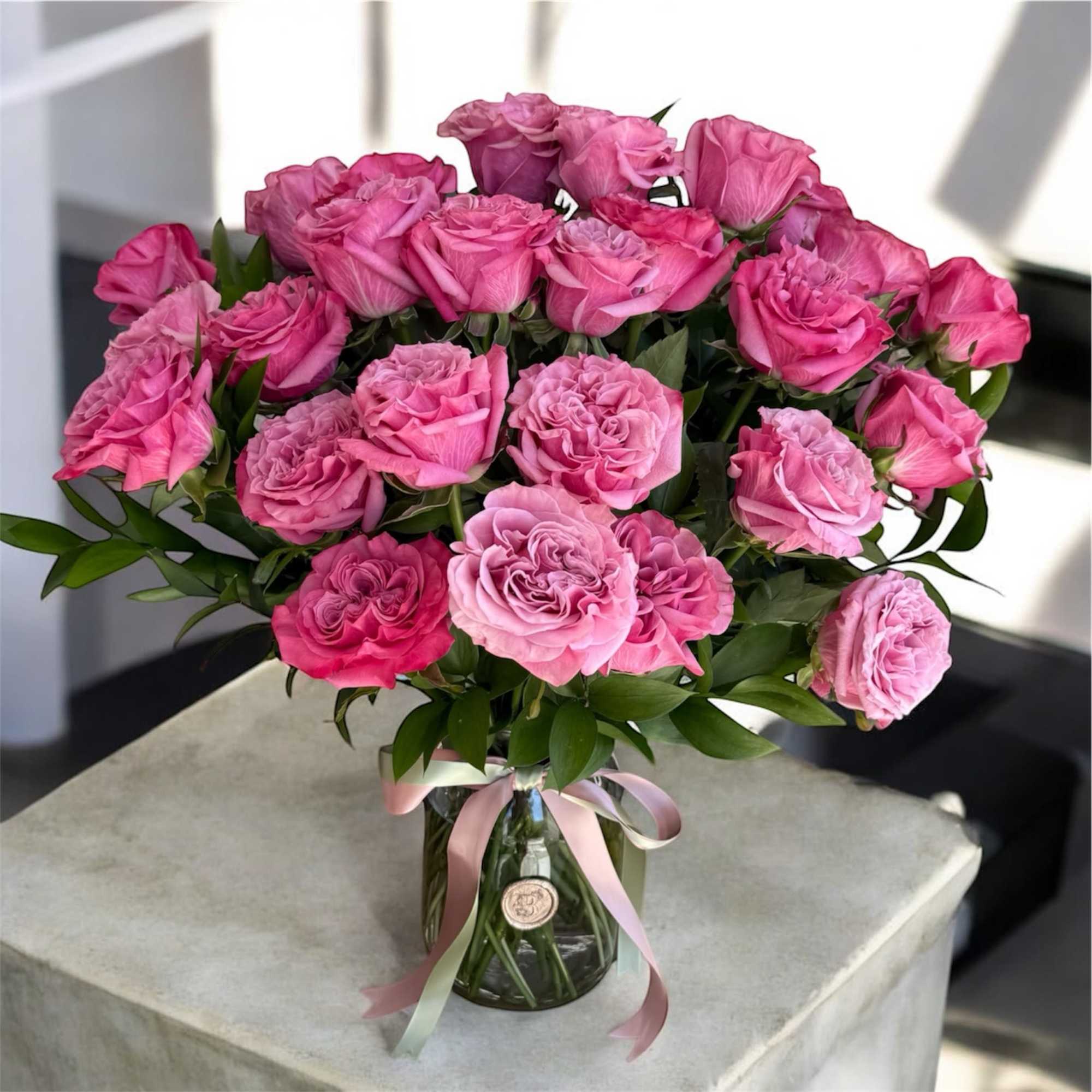 Blushing Hearts features soft pink roses whose petals naturally form a heart