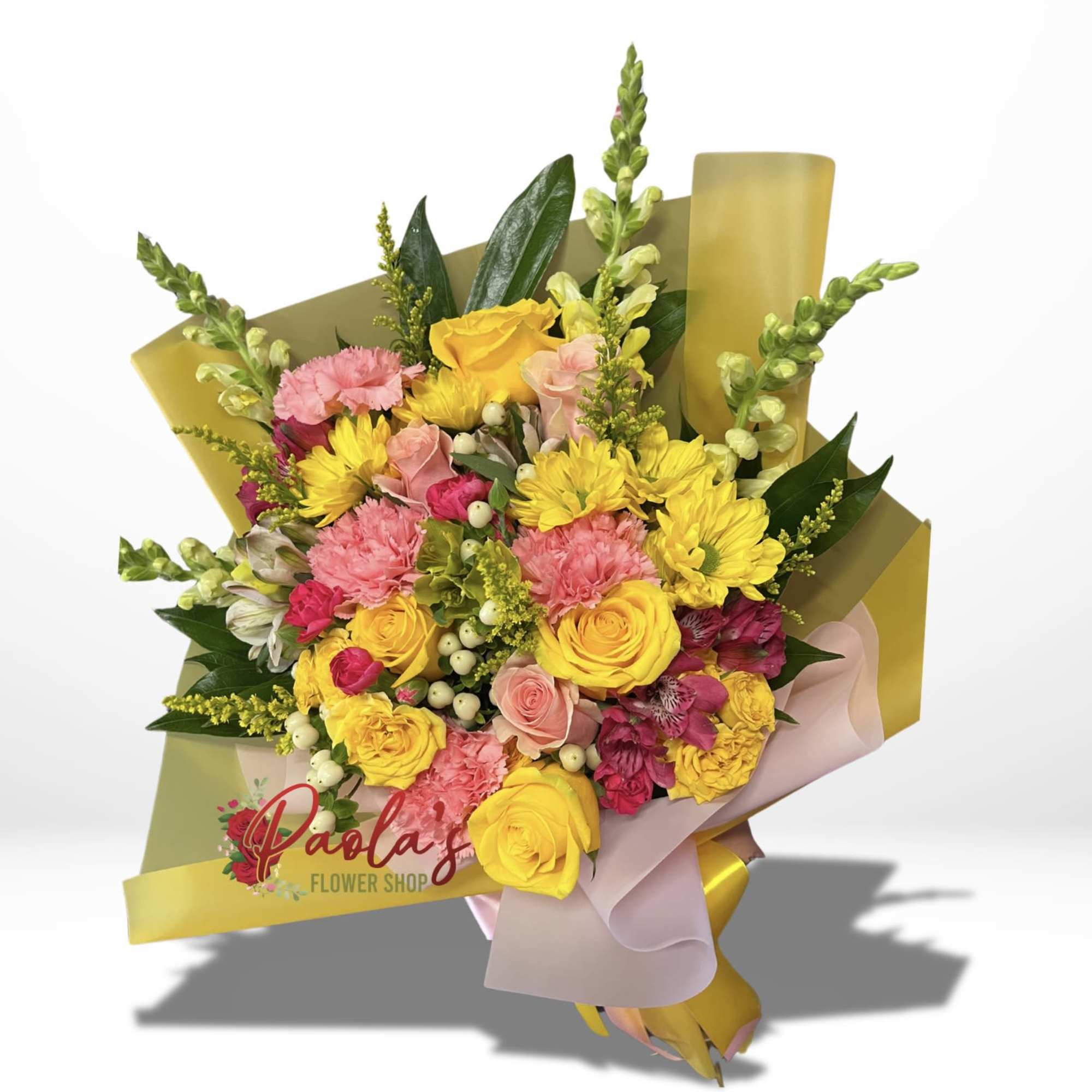 This charming bouquet features a vibrant mix of yellow and pink flowers.