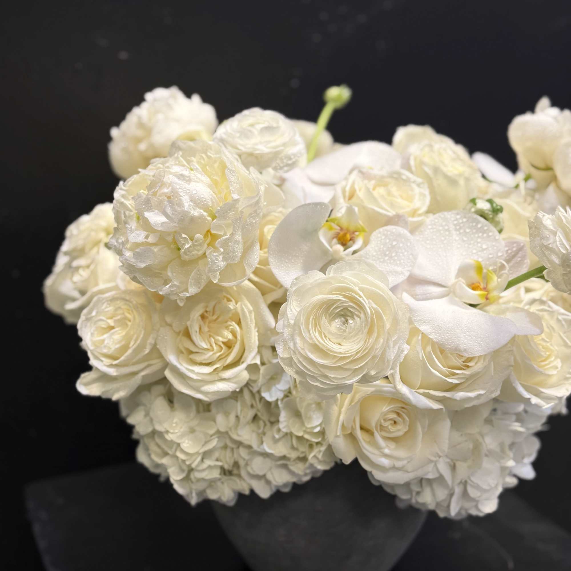 Midas Touch is an all-white floral arrangement that embodies effortless luxury and