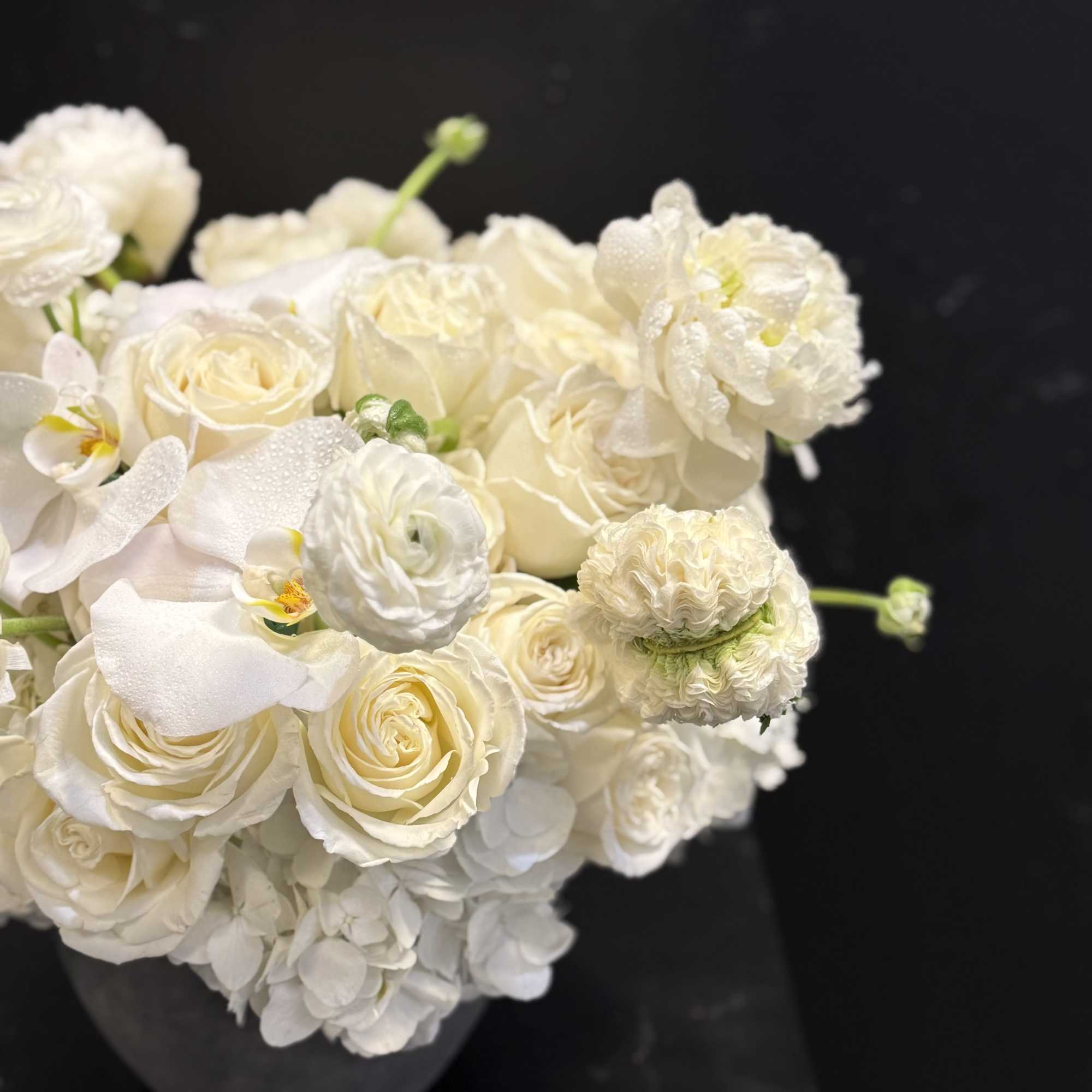 Midas Touch is an all-white floral arrangement that embodies effortless luxury and