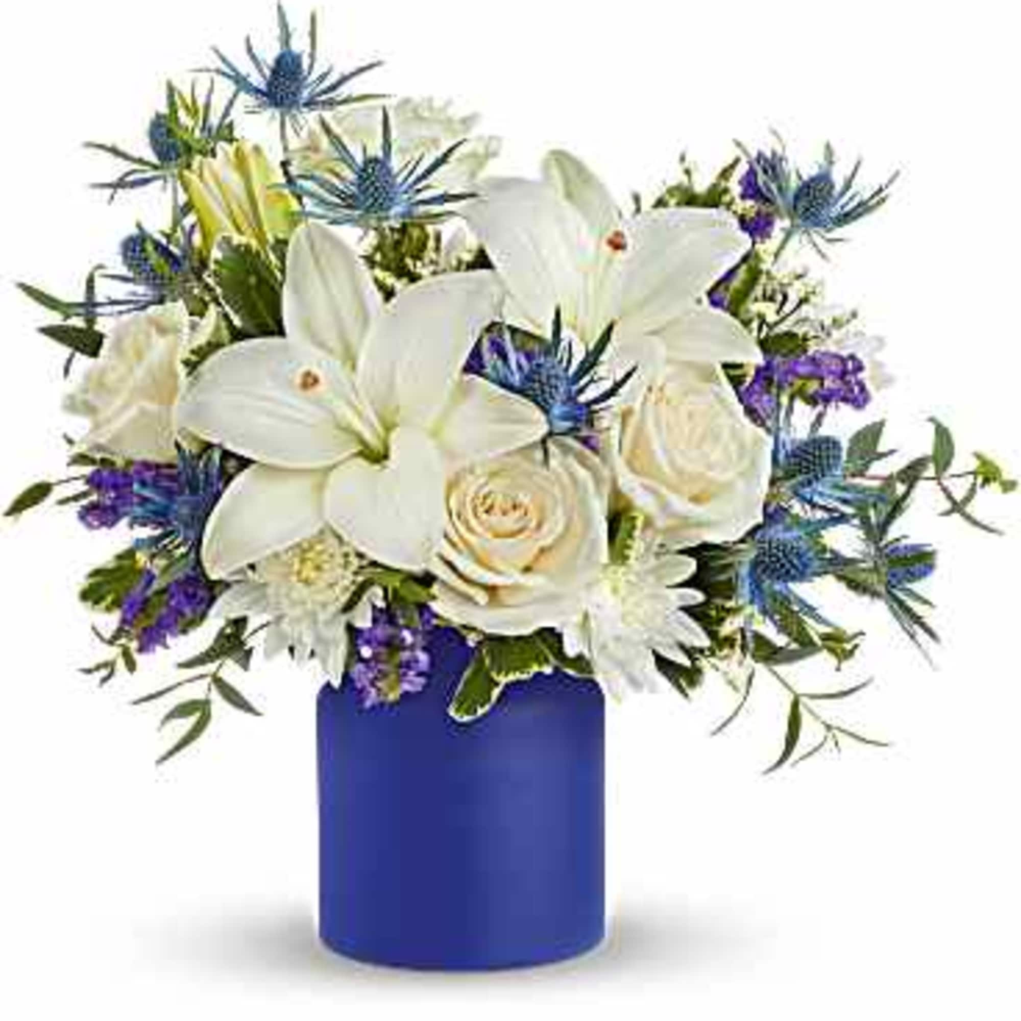 A beautiful expression of tranquility, Teleflora's Blue Harmony Bouquet features lush white