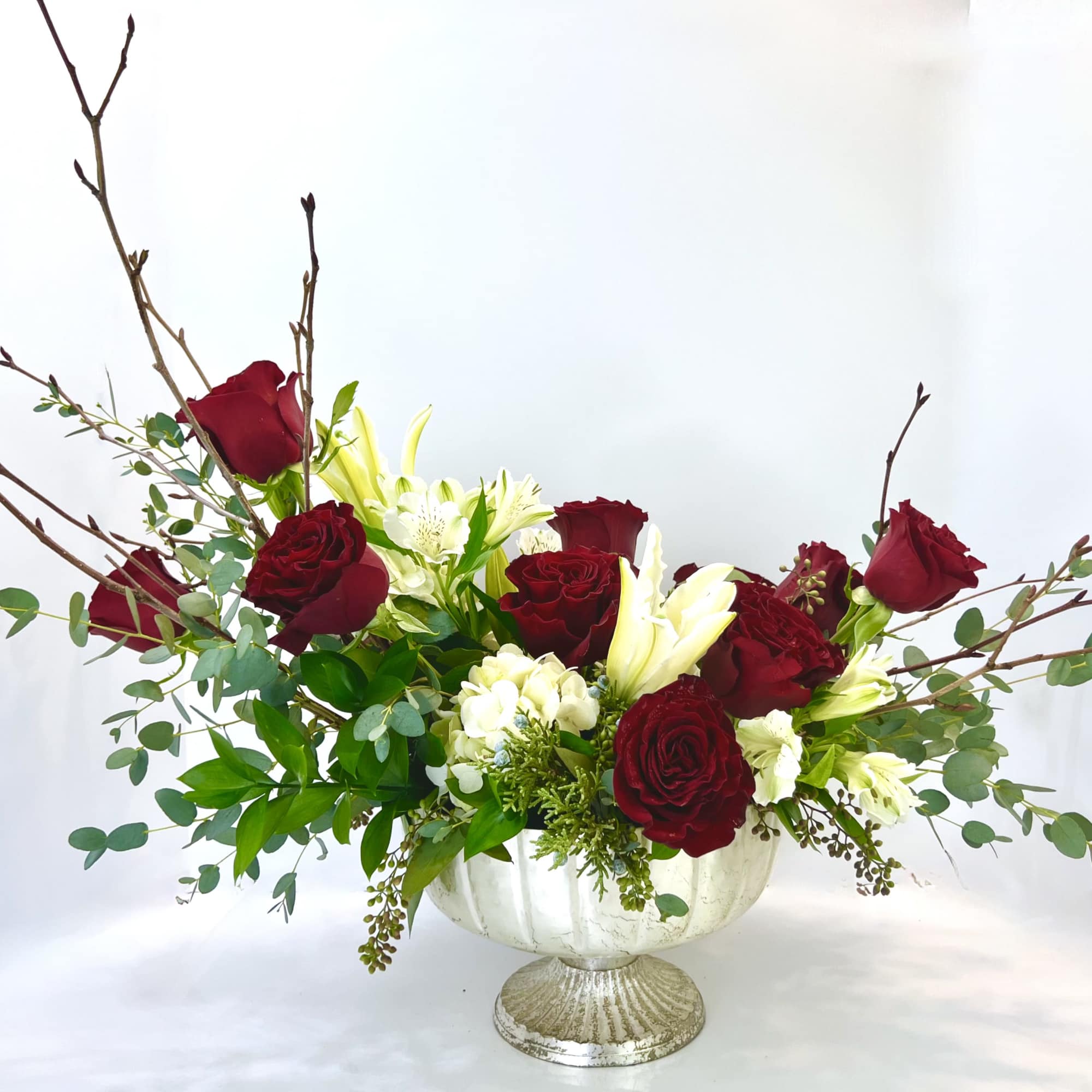 Surprise your lover or treat yourself to a dramatic dozen roses in