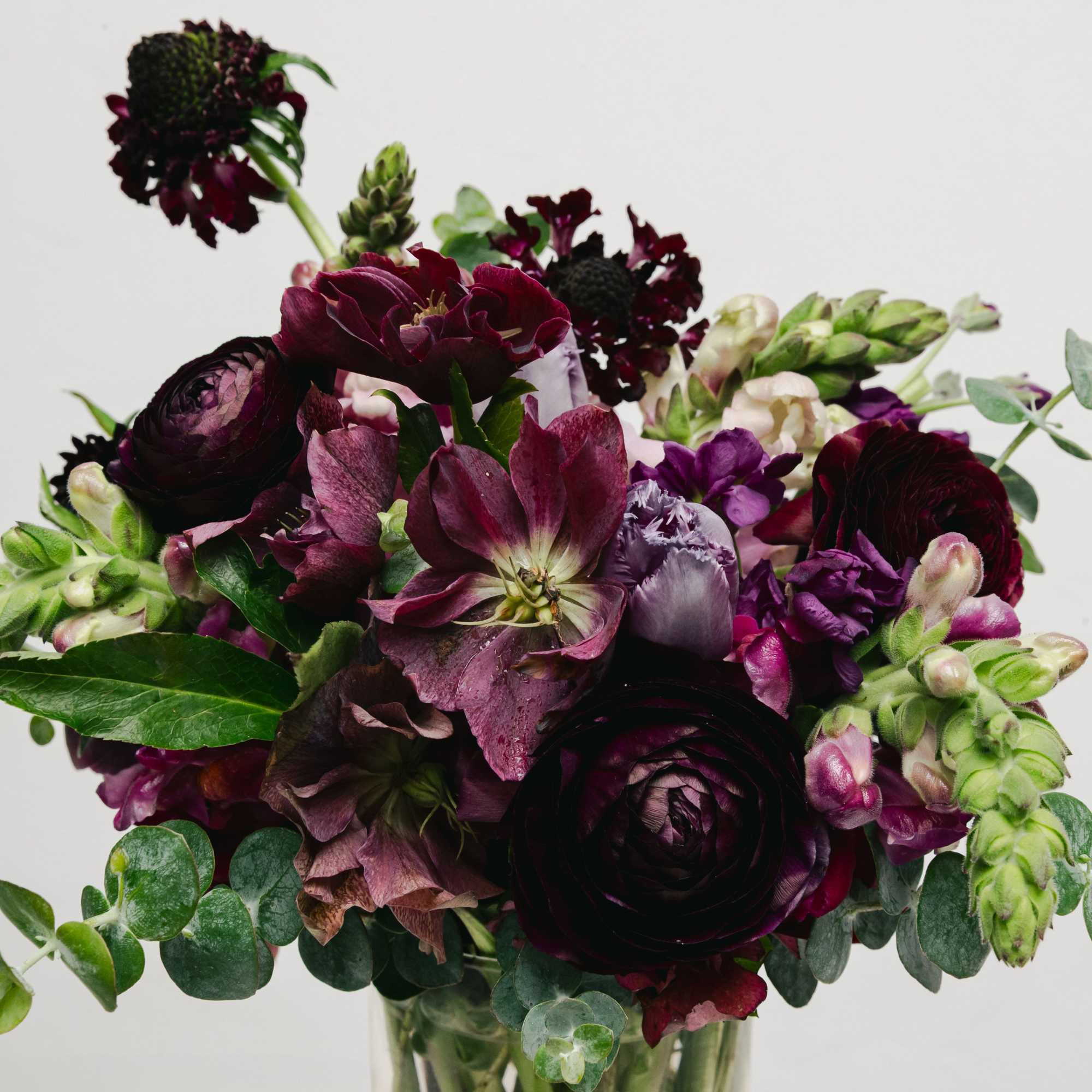 The Mini Moody Design is a captivating floral arrangement, perfect for expressing