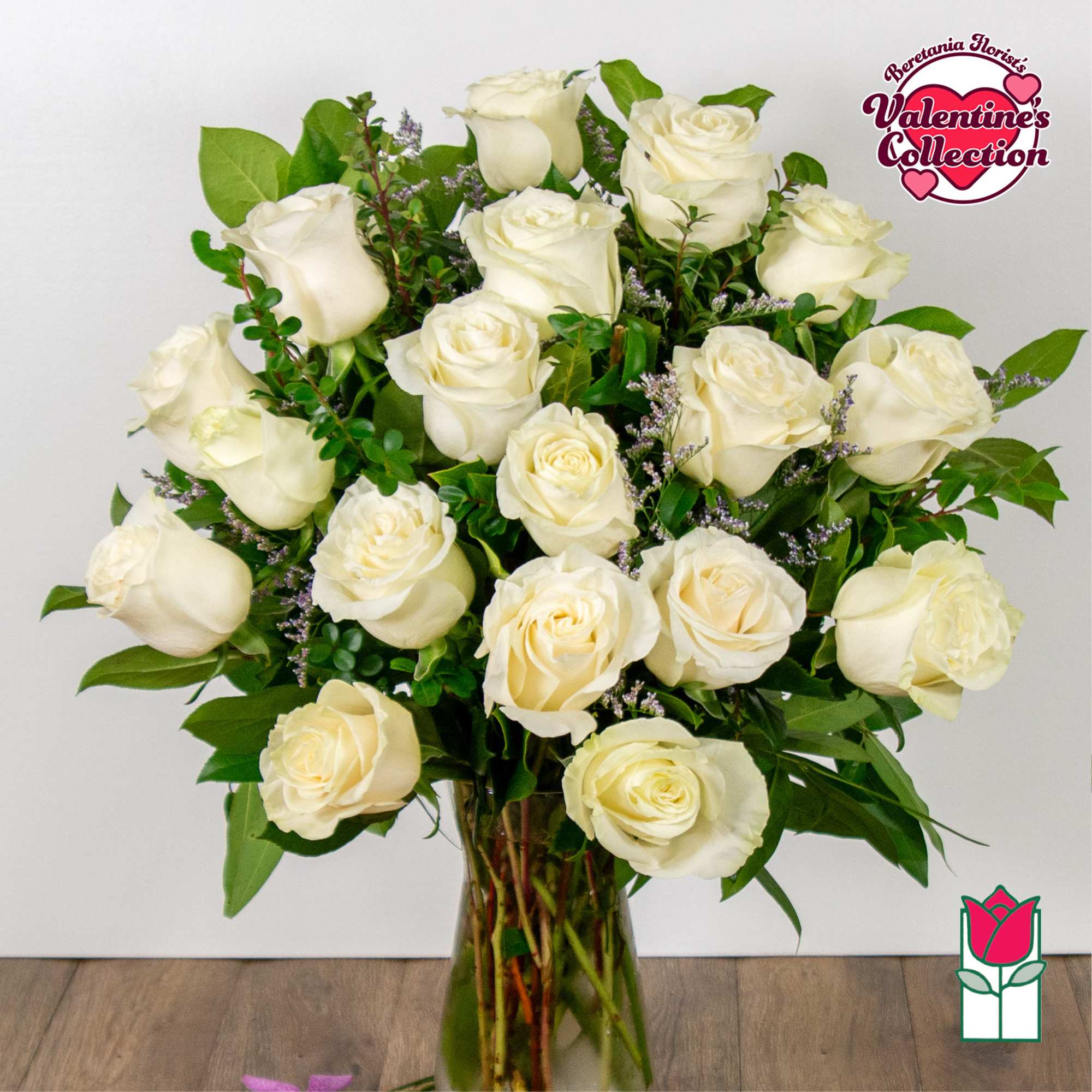 Indulge in the timeless elegance of our Medium Stem Rose Arrangement, meticulously