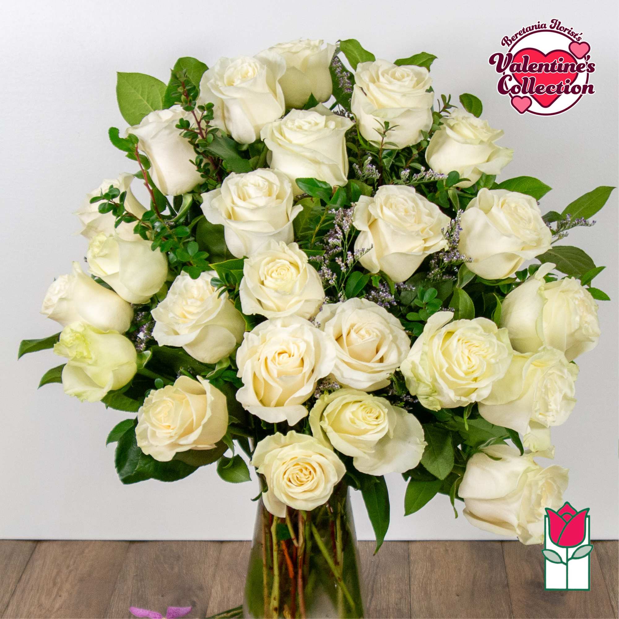 Indulge in the timeless elegance of our Medium Stem Rose Arrangement, meticulously