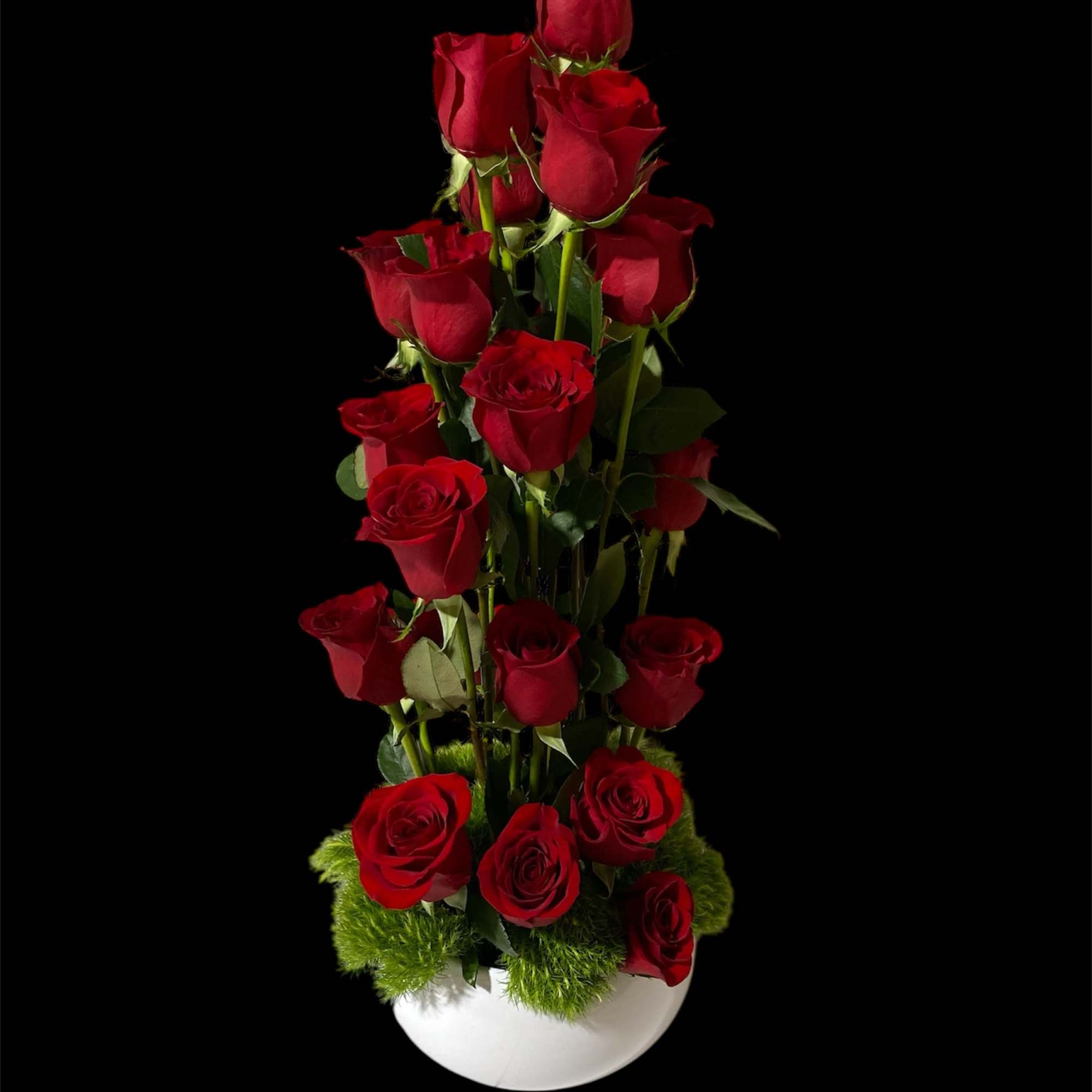 Description:
A modern trend-forward vertical composition of Premium red roses arranged with intention