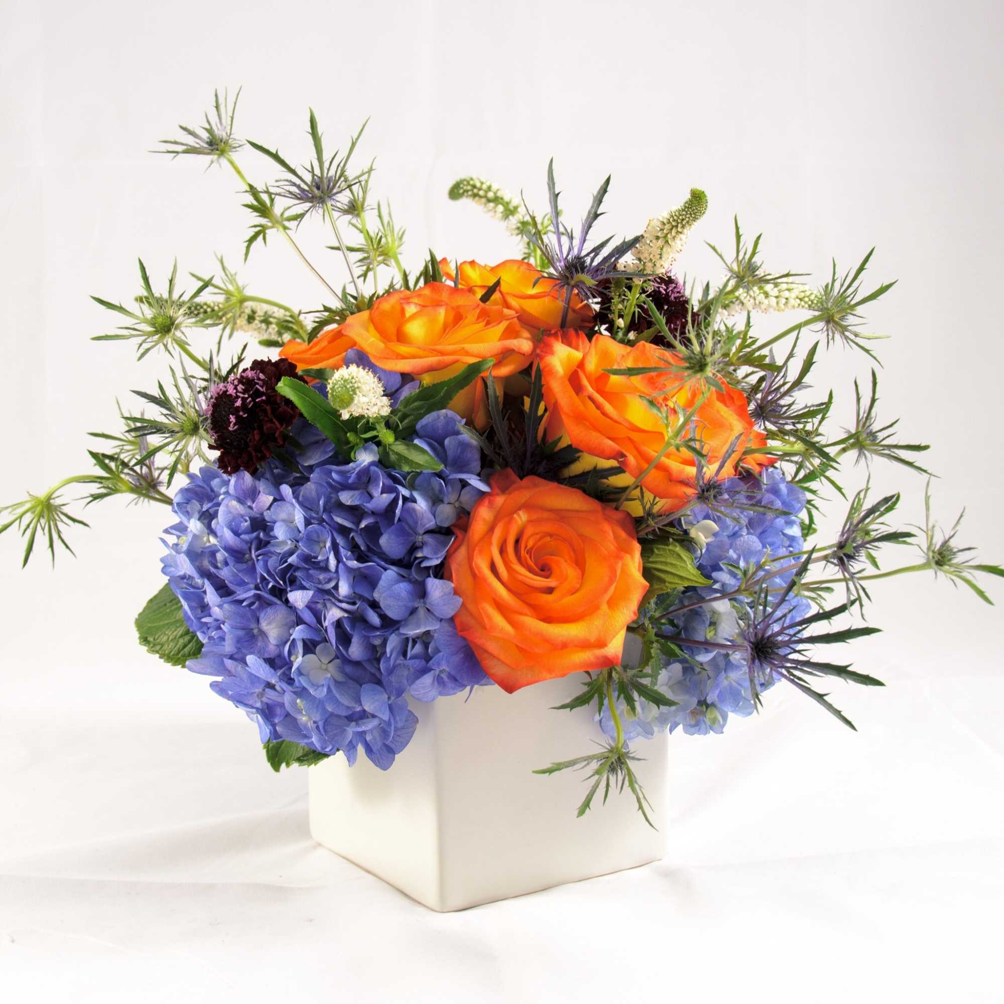 A bright and colorful low-compact arrangement for any special events, parties, birthdays