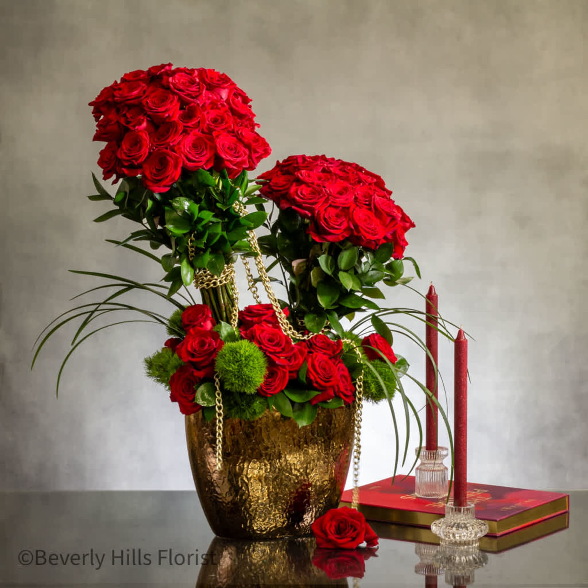 Experience the ultimate luxury with our striking display of red roses, elegantly