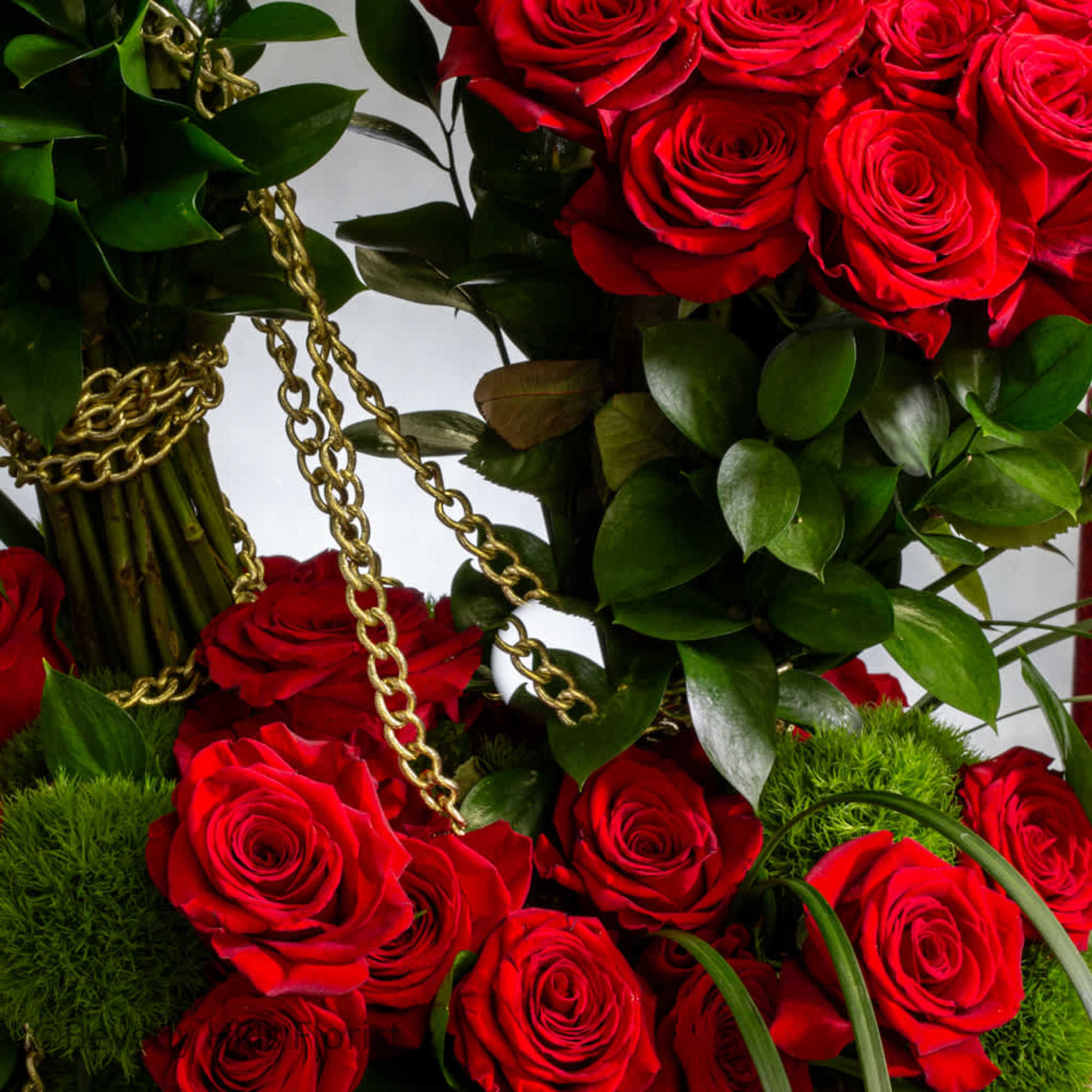 Experience the ultimate luxury with our striking display of red roses, elegantly
