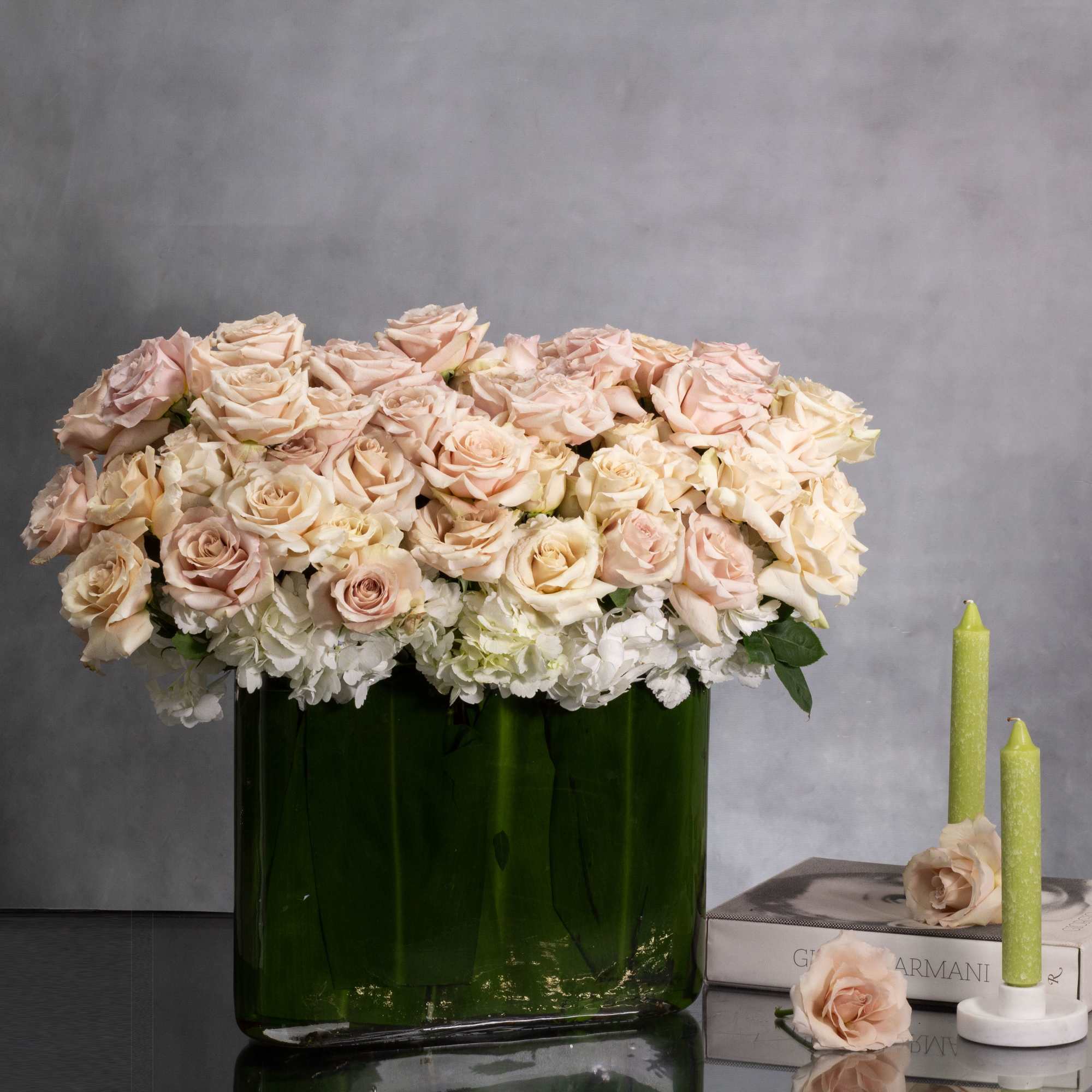 Indulge in the serene beauty of our 'Blush Hydrangea Delight' arrangement. Delicately