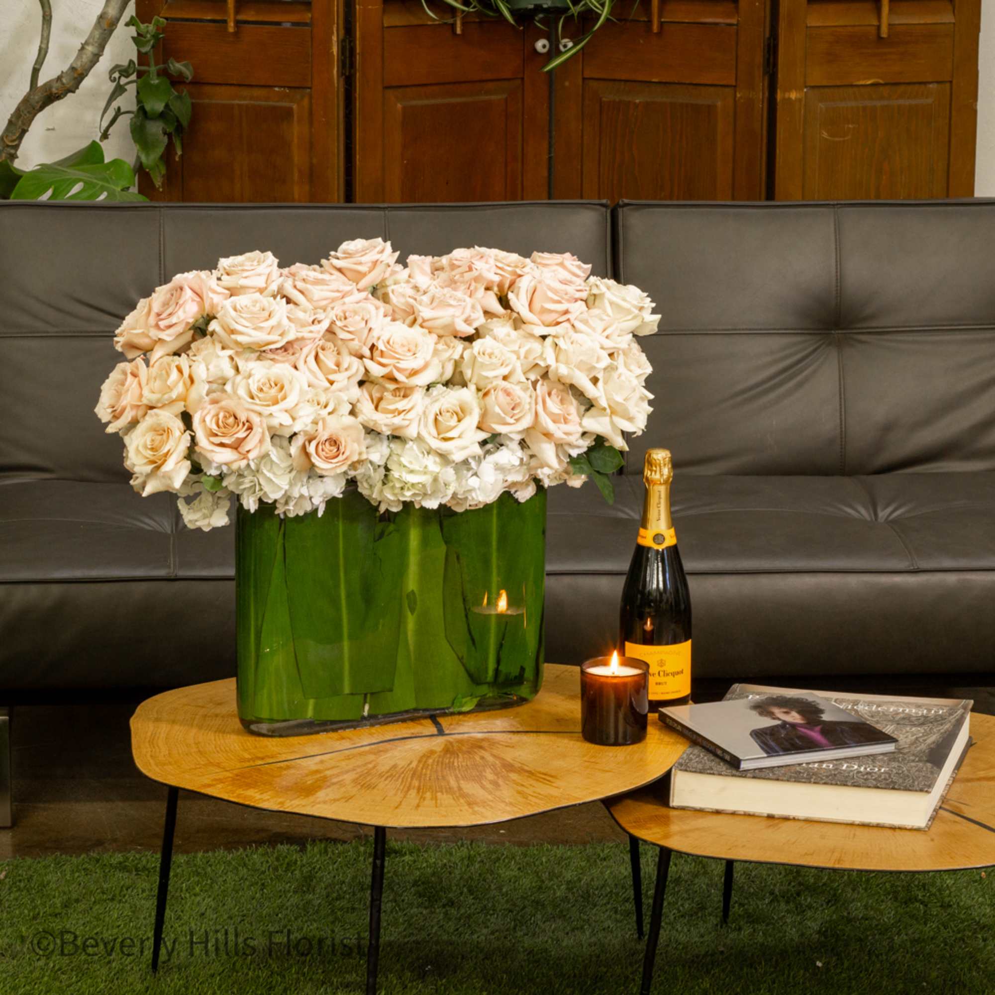 Indulge in the serene beauty of our 'Blush Hydrangea Delight' arrangement. Delicately