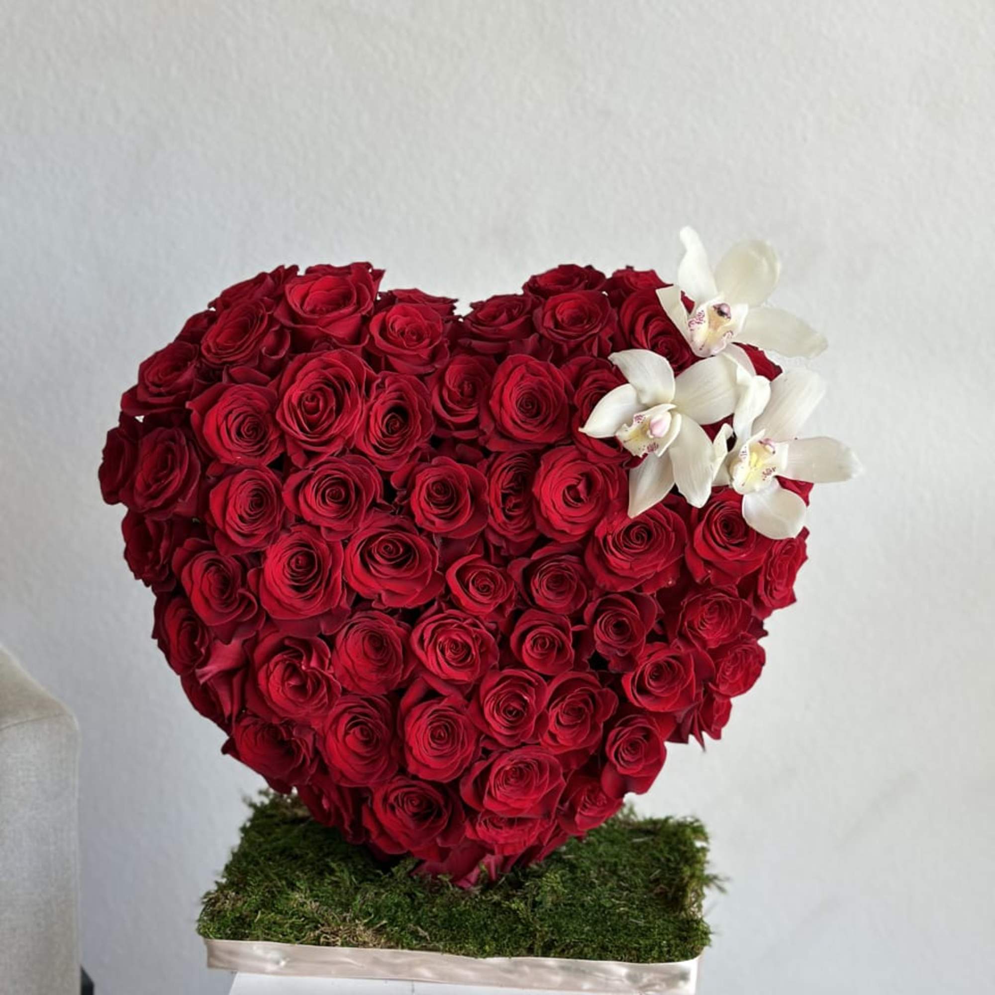 This beautiful arrangement filled with the 120- 150 red roses for SMALL