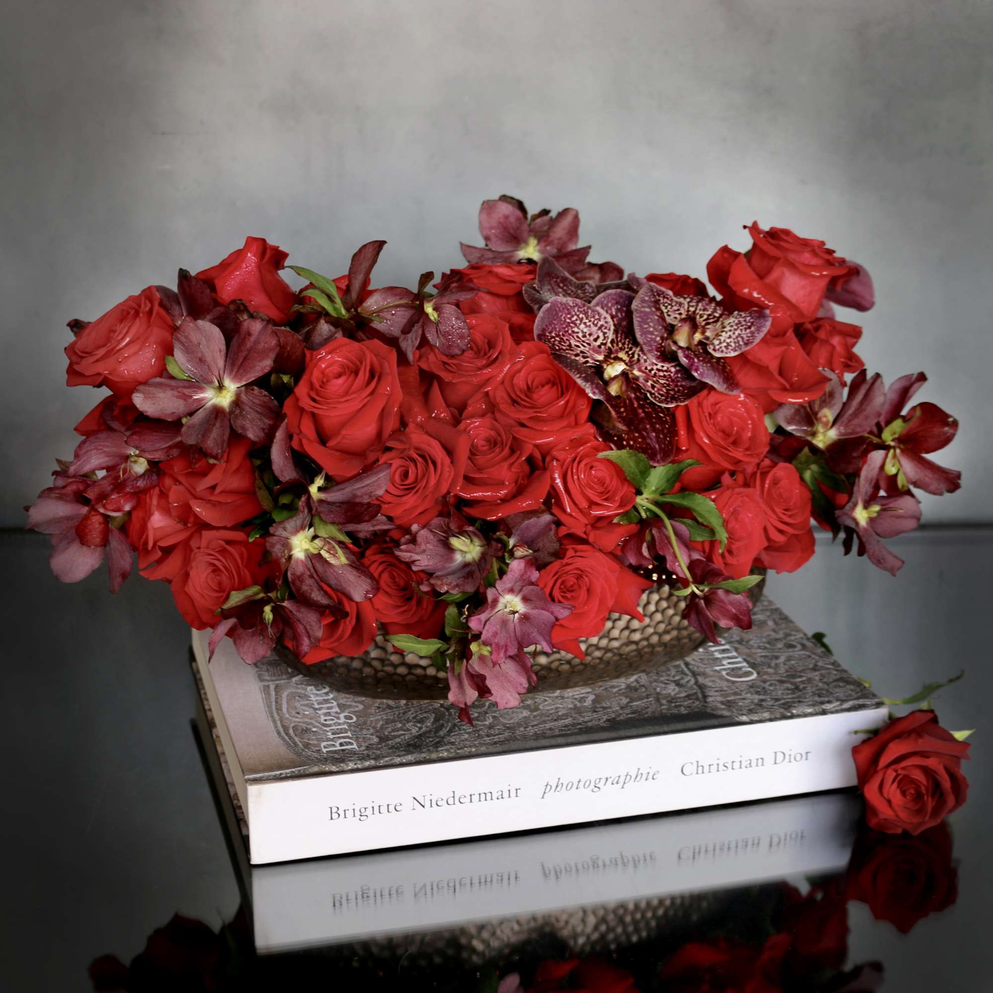 "Adore Me" is a romantic and rich arrangement filled with beautiful red