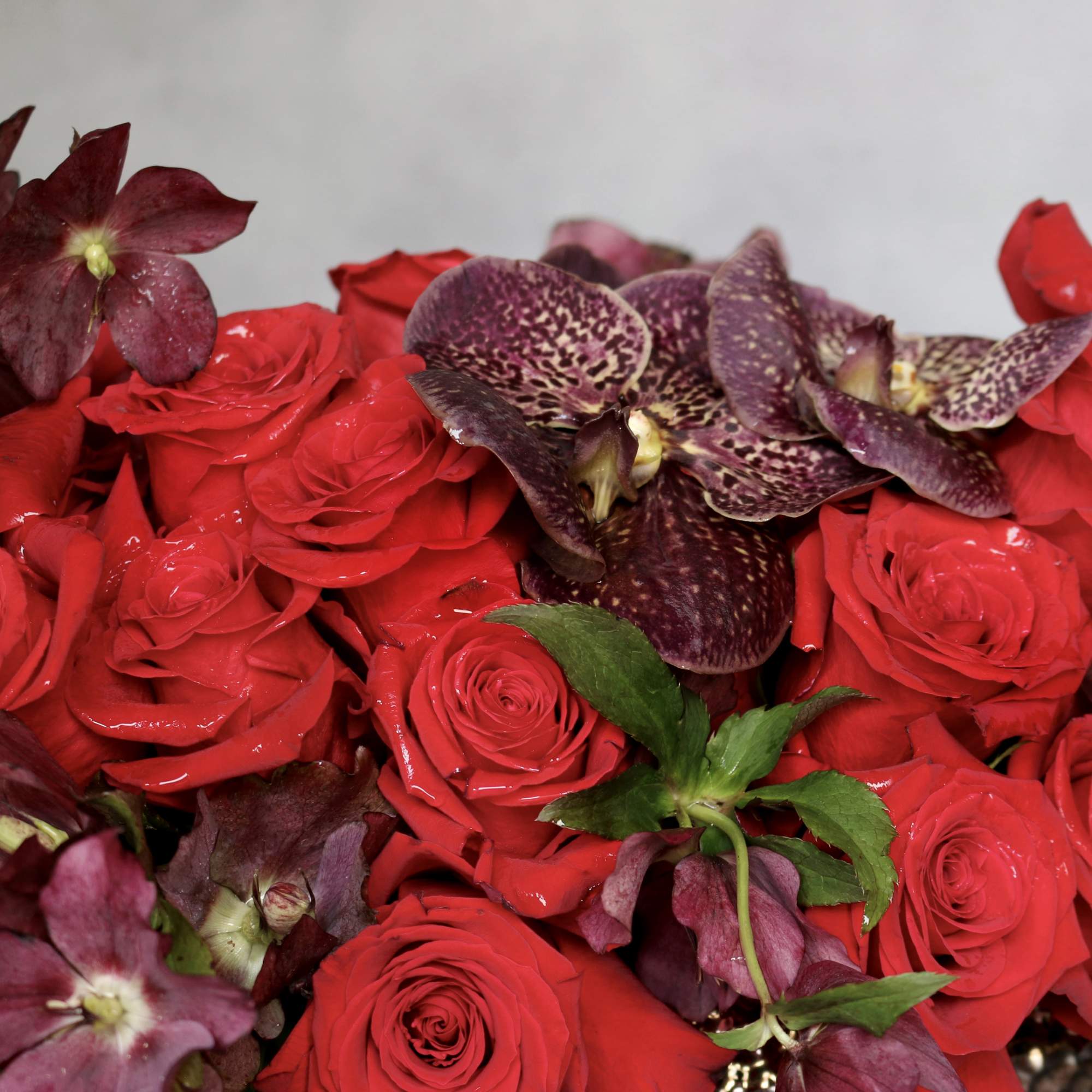 "Adore Me" is a romantic and rich arrangement filled with beautiful red