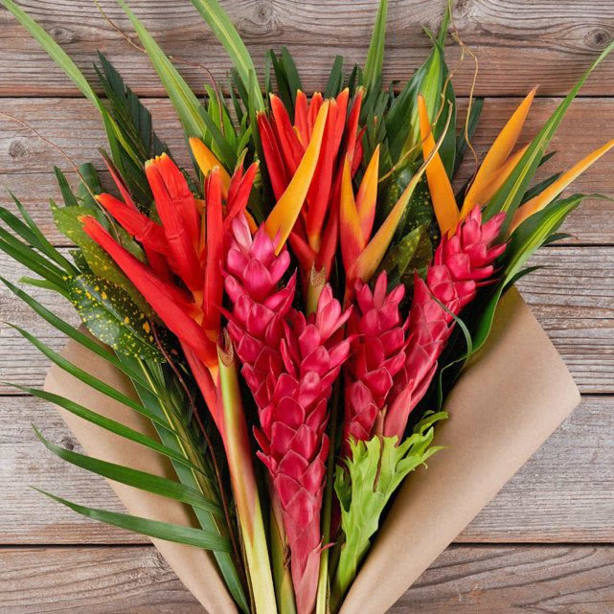 Tropical Explosion is a bold mix of premium tropical flowers designed to