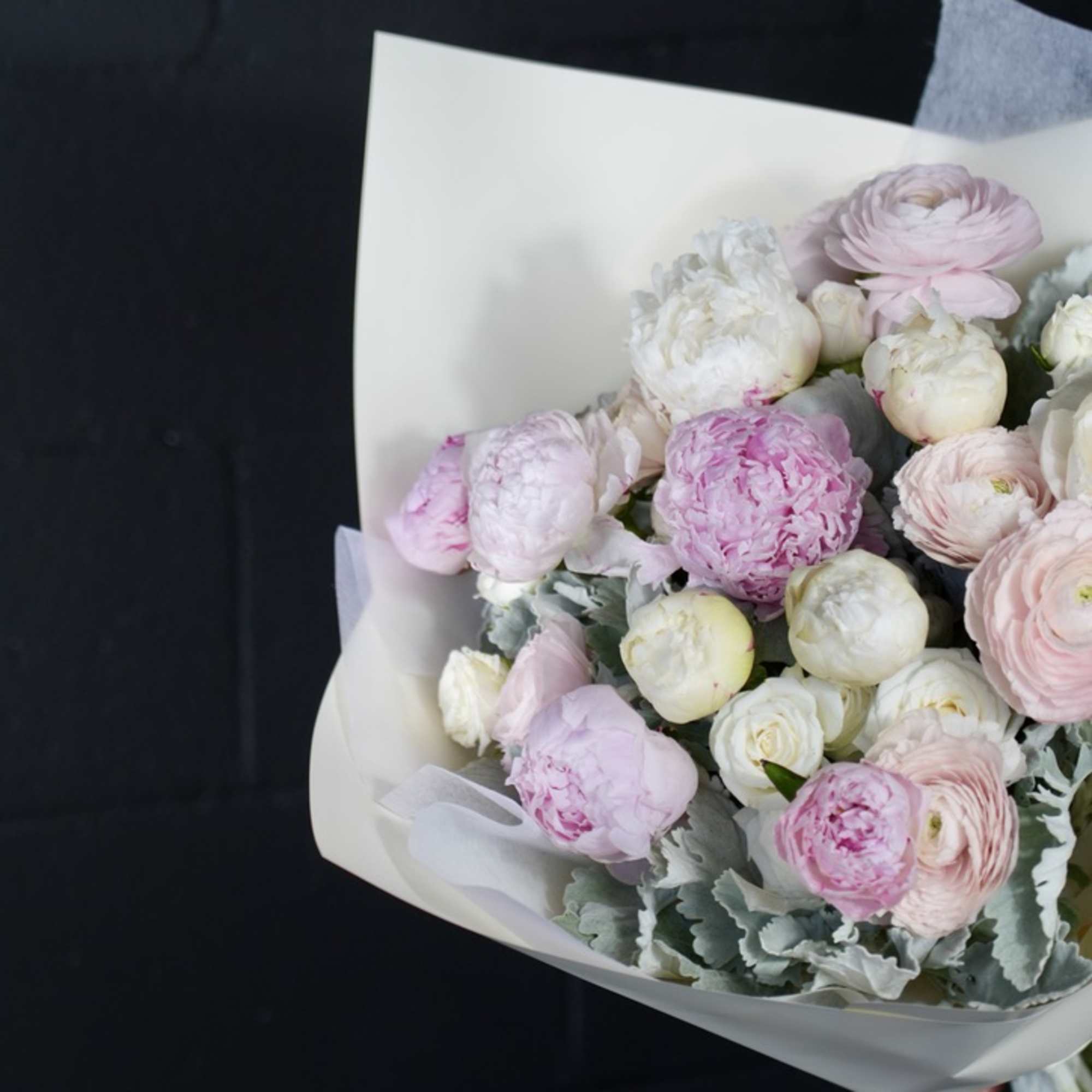 The Whispering Elegance Bouquet is a stunning arrangement that radiates sophistication and