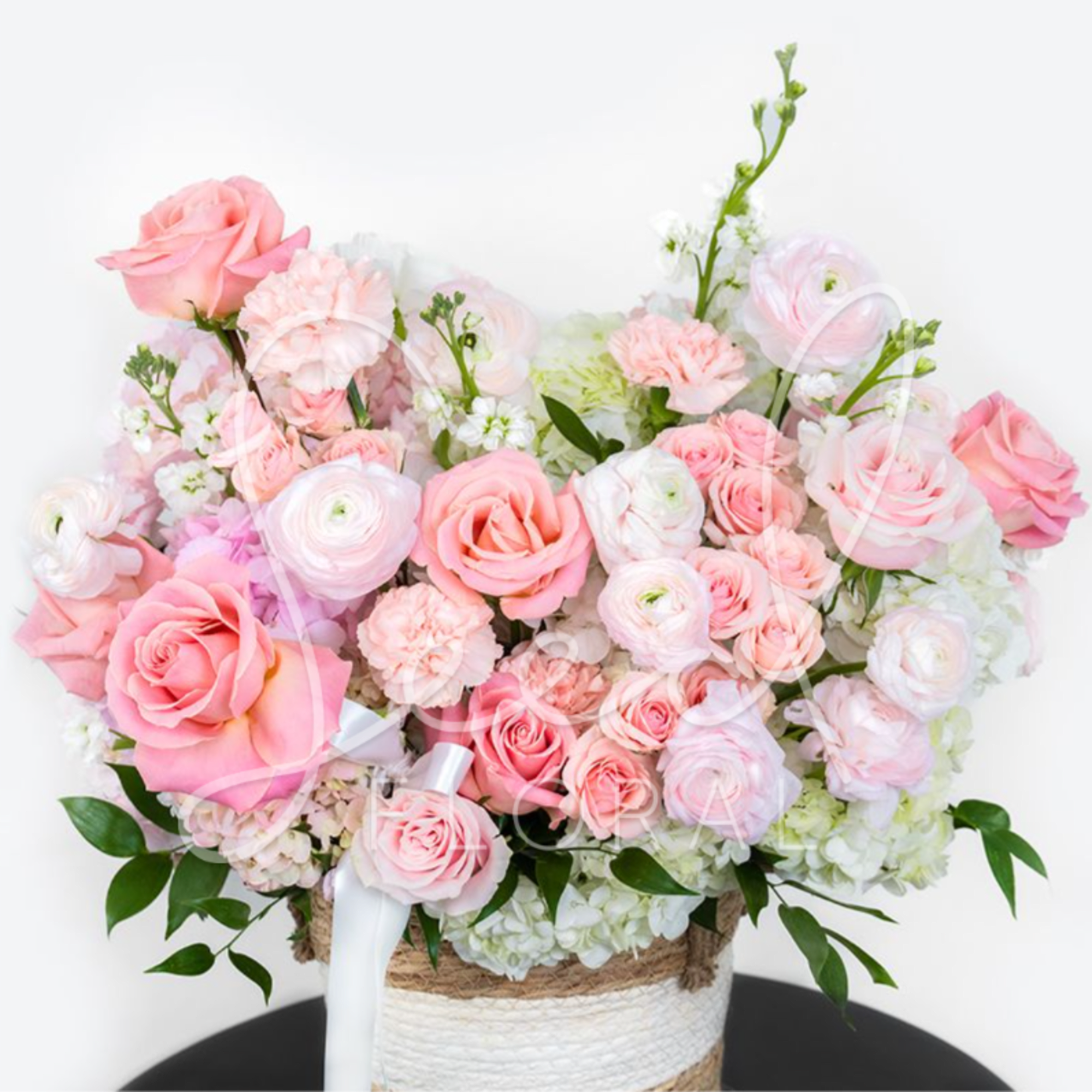 Love in Bloom Basket is a soft, elegant flower arrangement celebrating love