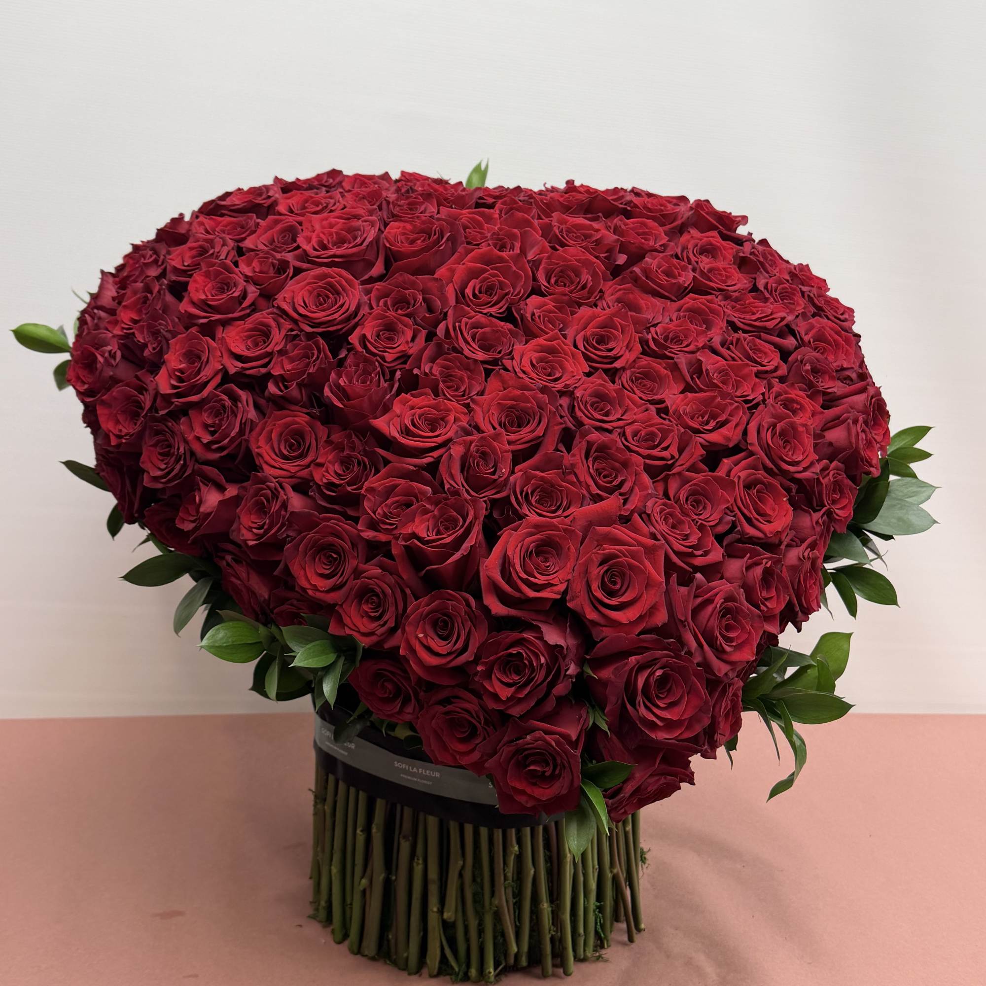 Make a bold, unforgettable statement with our Heart of Love arrangement. Hand-crafted