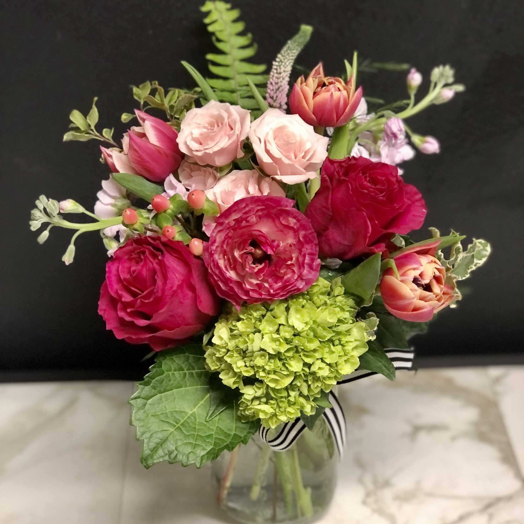 A pretty seasonal garden mix in shades of soft to hot pink.