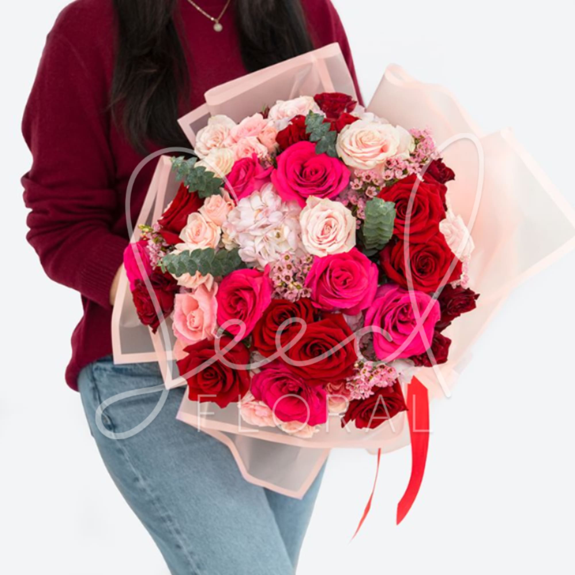 The Scarlet Kiss Bouquet is a striking expression of love, designed to