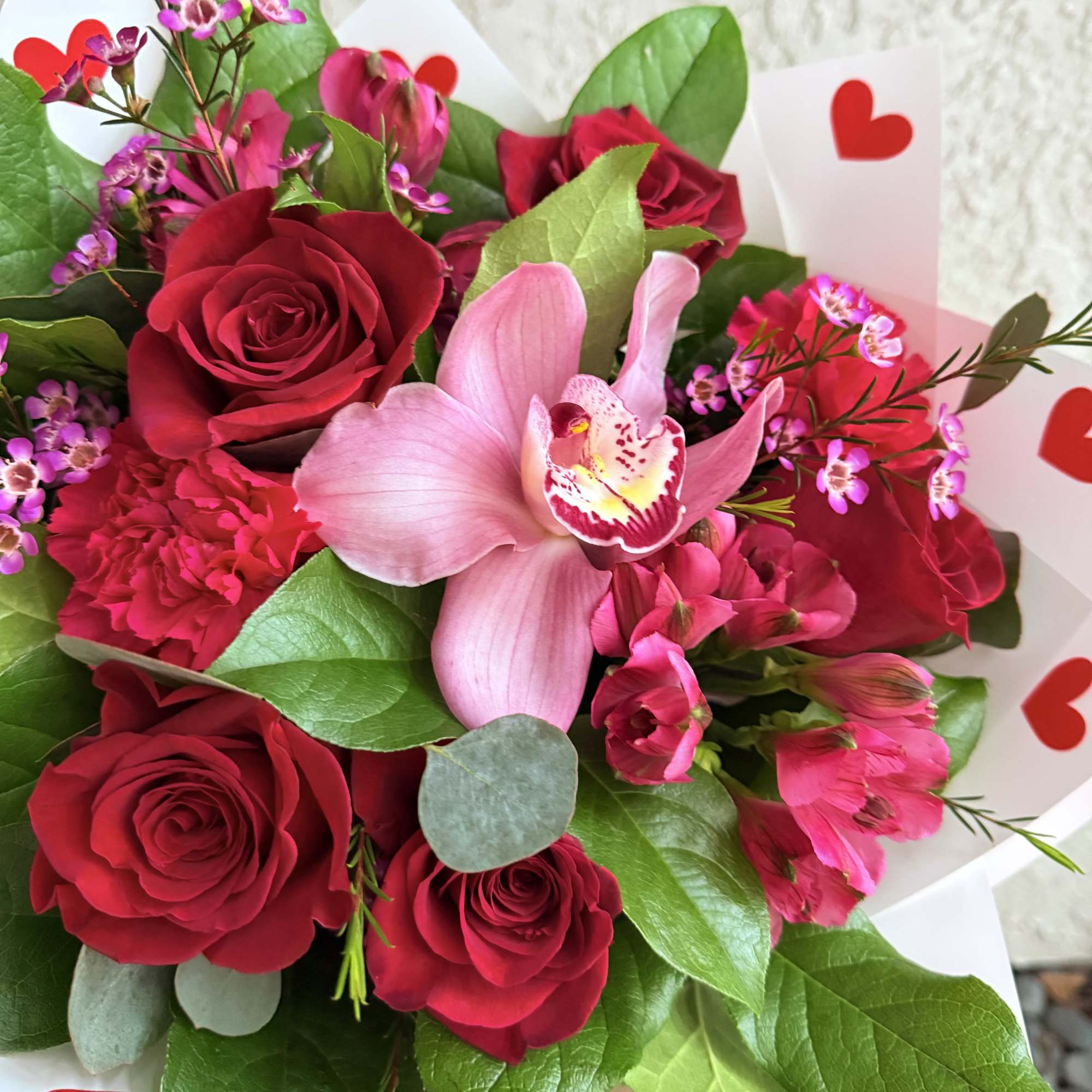 Gorgeous bouquet crafted with premium flowers in valentine&rsquo;s  colors: premium roses