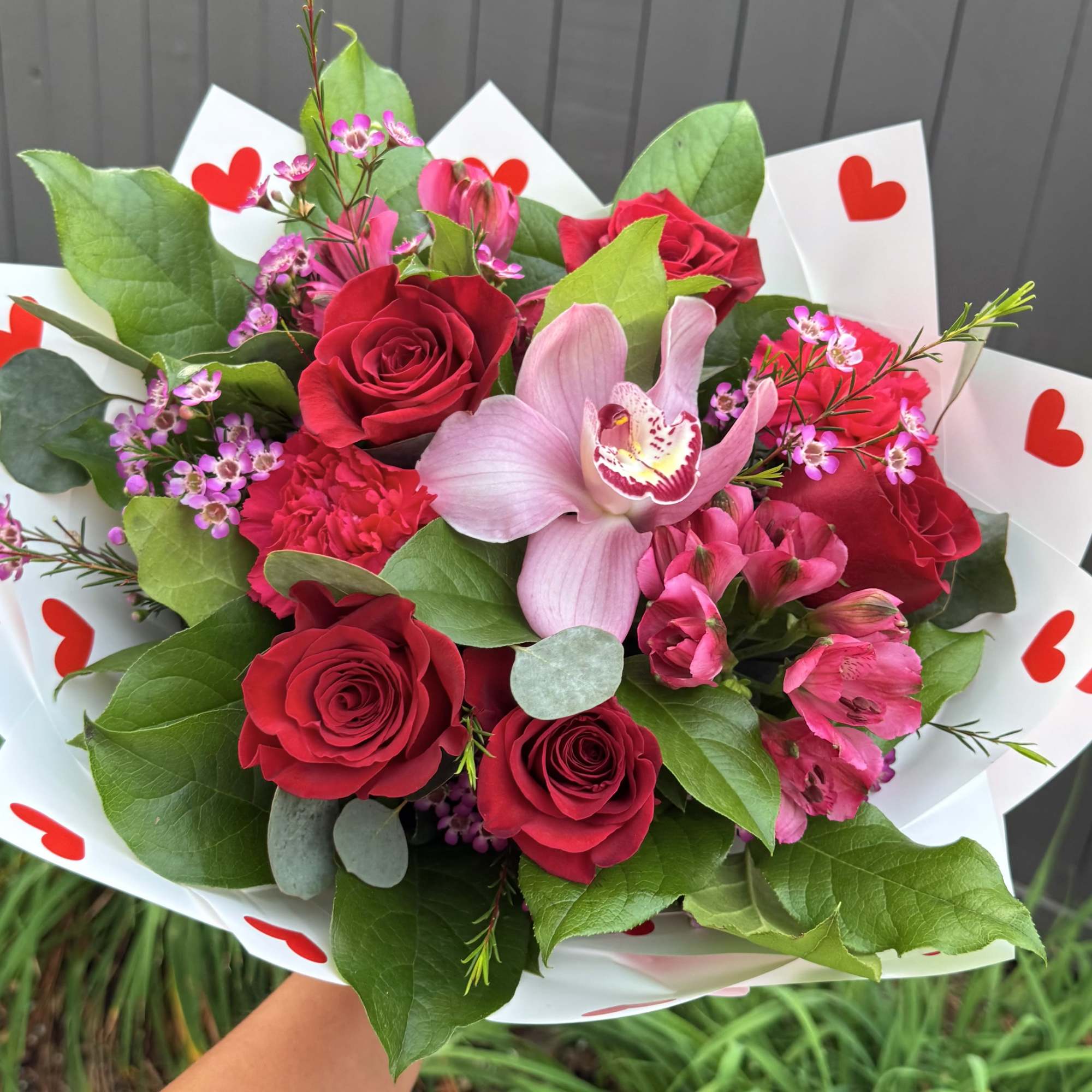Gorgeous bouquet crafted with premium flowers in valentine&rsquo;s  colors: premium roses