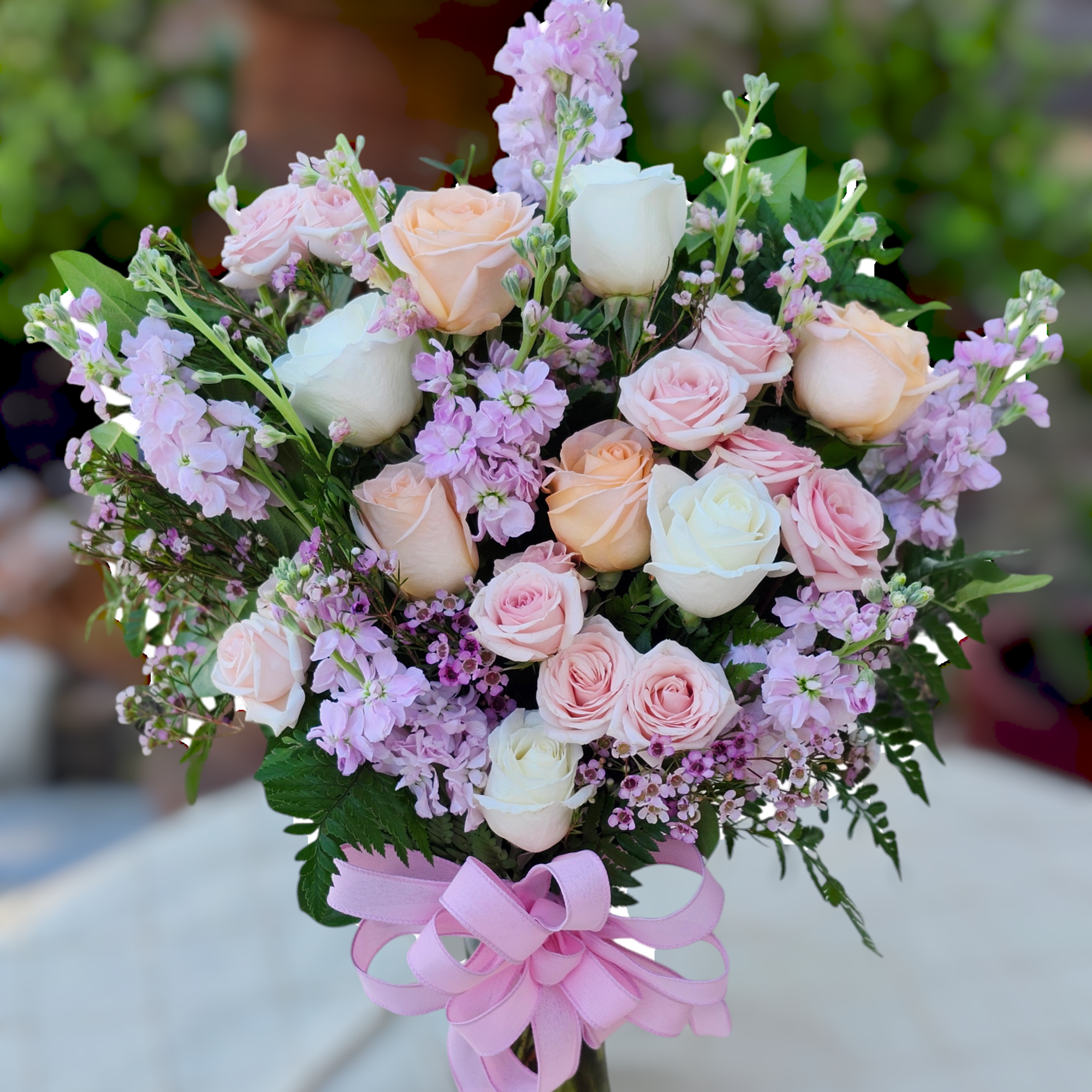 Tall soft colors lavender, peach, pinks one sided vase. With a beautiful