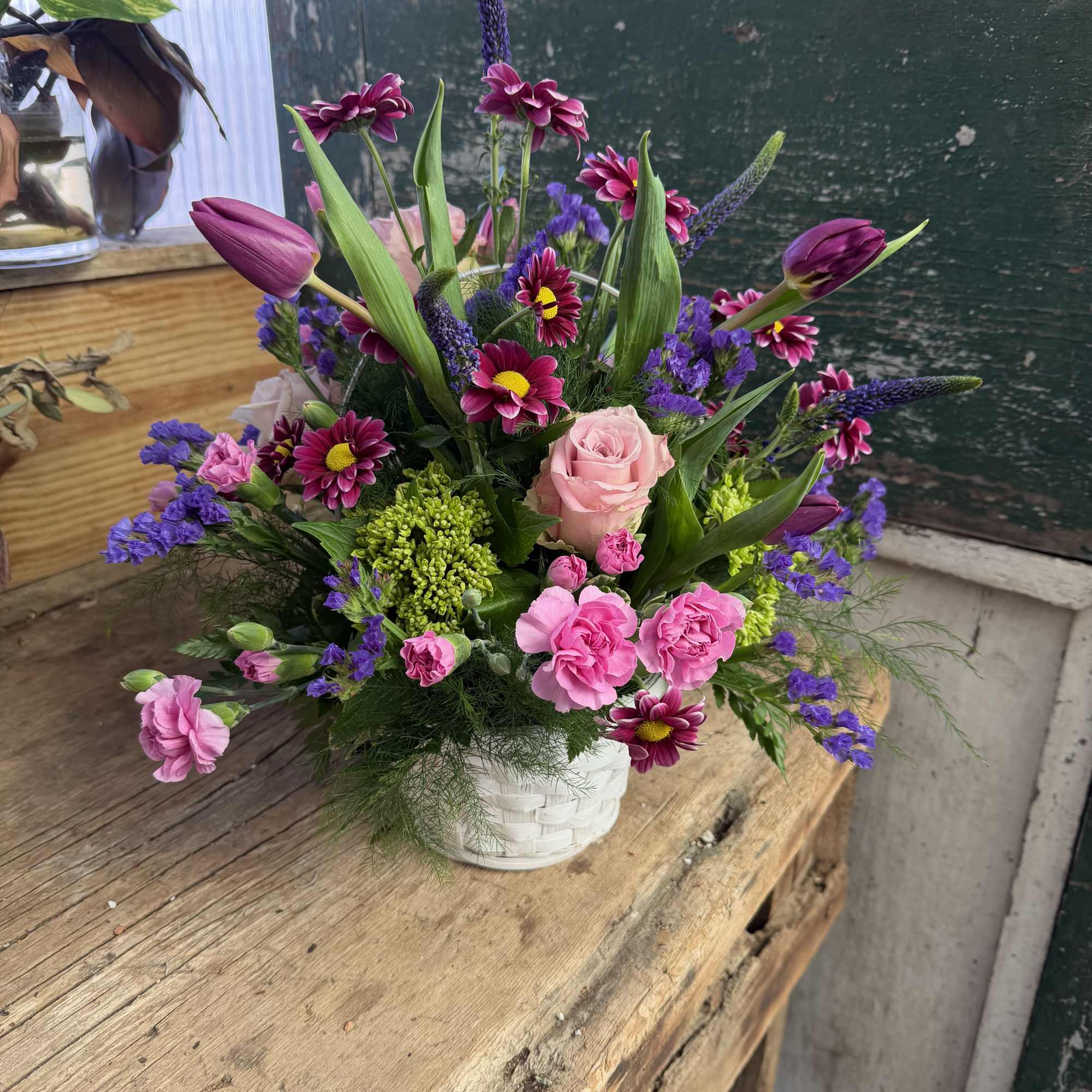 Lavender and lovely, our fresh-packed Greeting Basket features alstroemeria, roses, daisies, mums