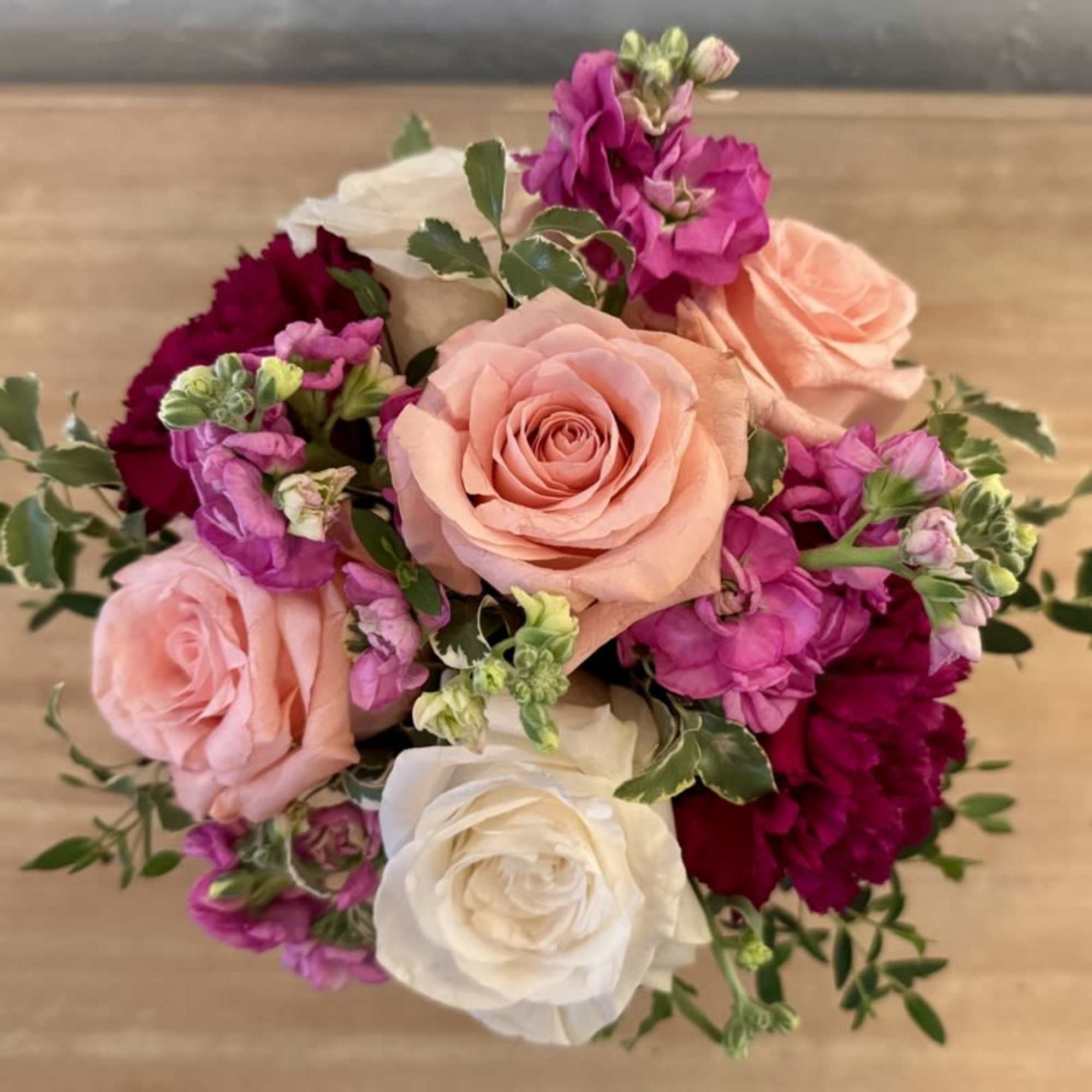 Bitty Blooms is a petite assortment of colorful blooms in an iridescent