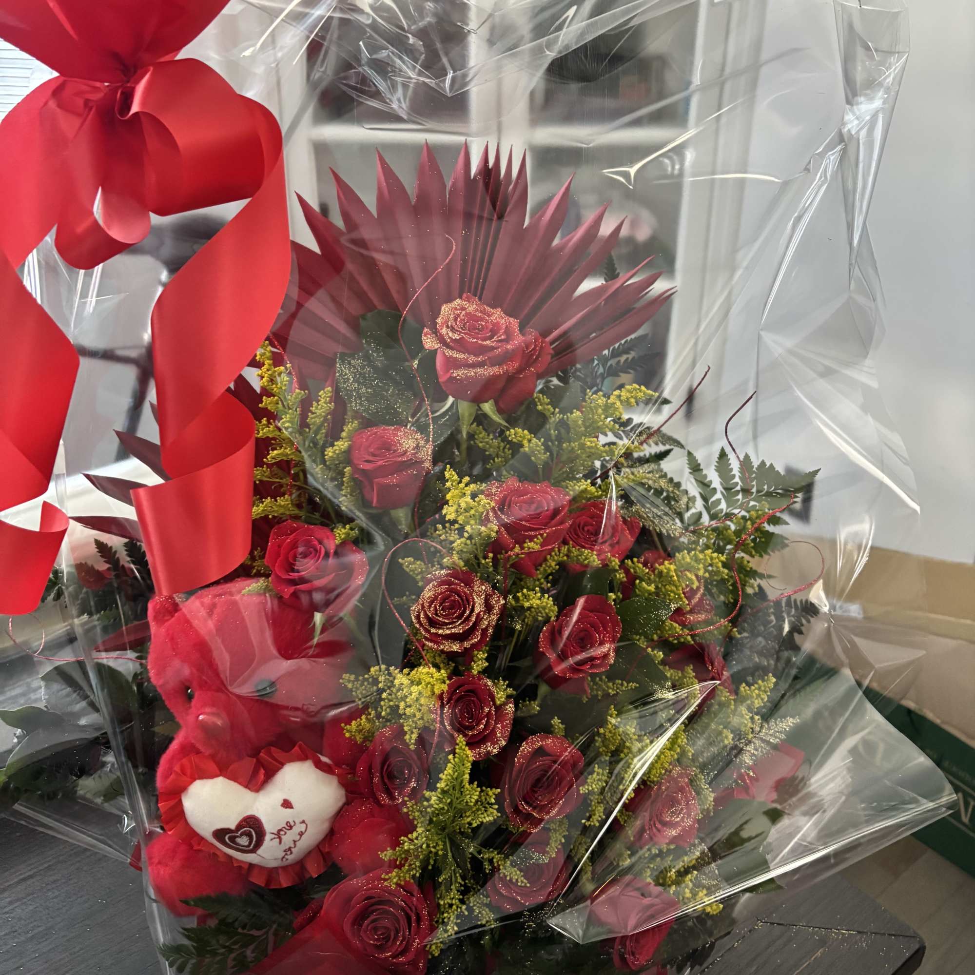 Oriental style rose bouquet with teddy bear and roses