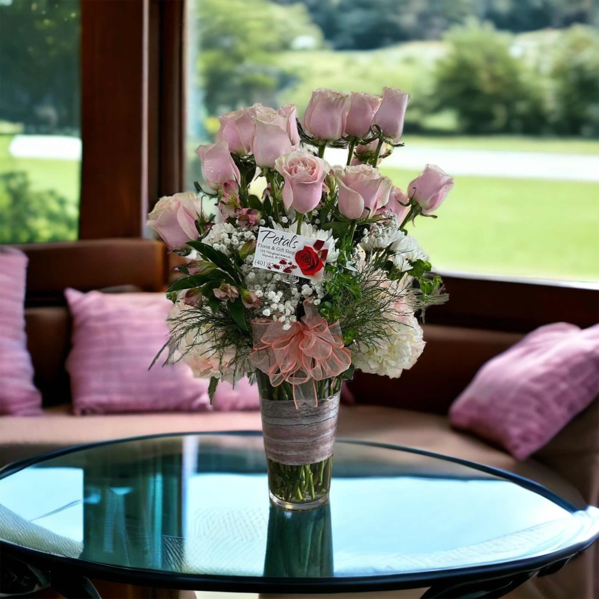  This stunning, tall arrangement is designed to impress your recipient. It
